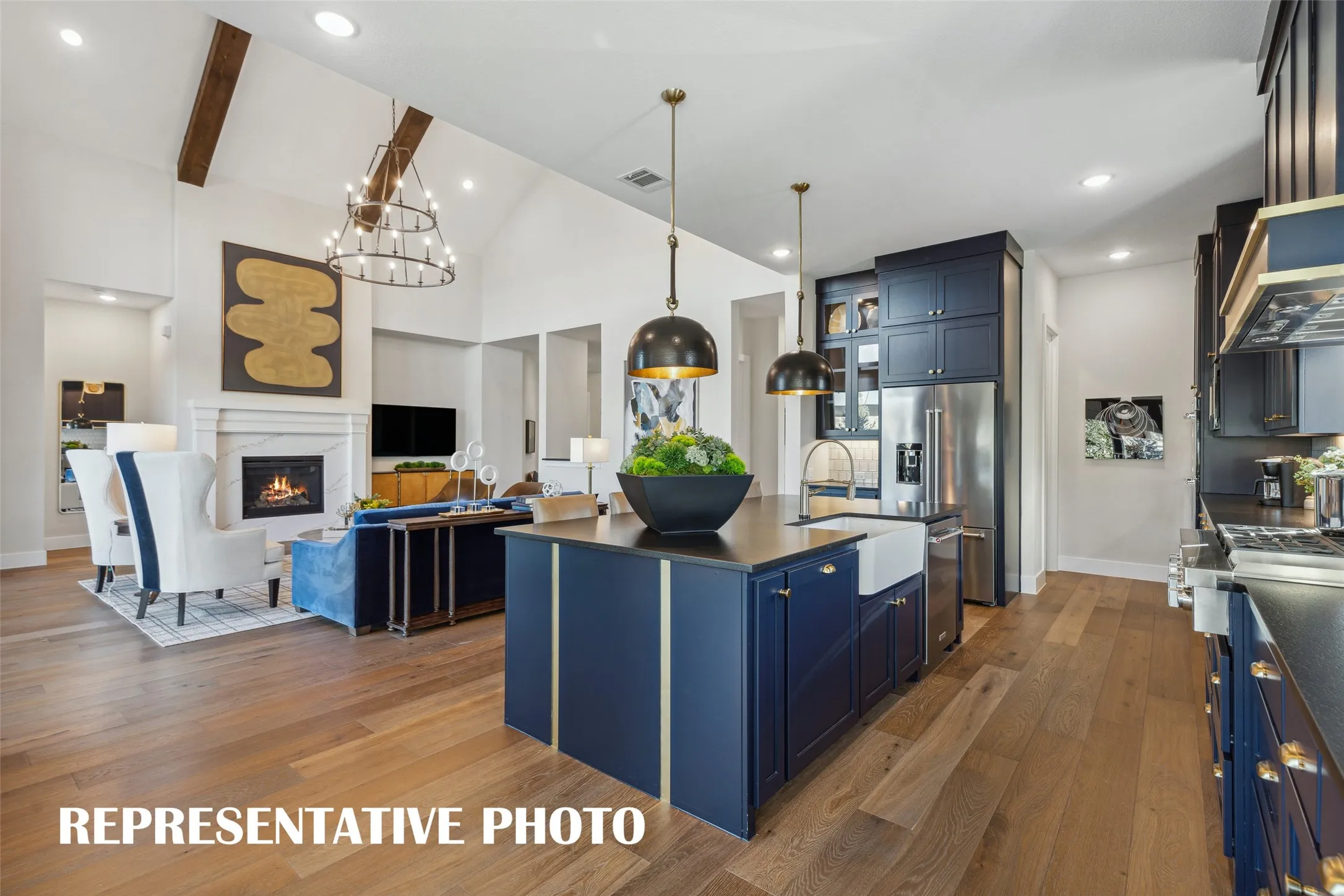 Featuring a chef's dream kitchen that is open to the family and dining rooms, entertaining is a breeze in our Madison II floor plan.  REPRESENTATIVE PHOTO