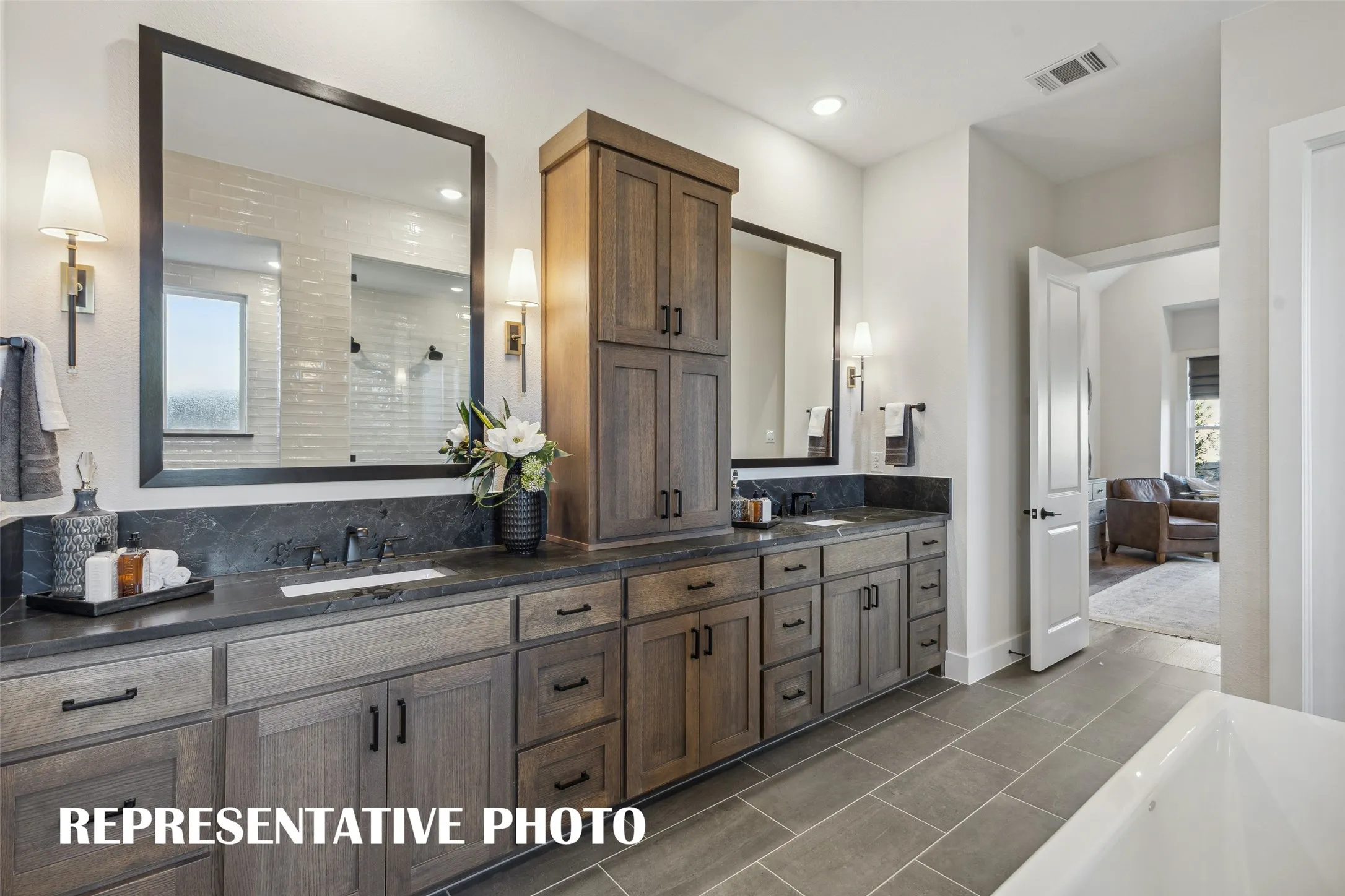 Plenty of space for two in this over the top owner's bath!  REPRESENTATIVE PHOTO