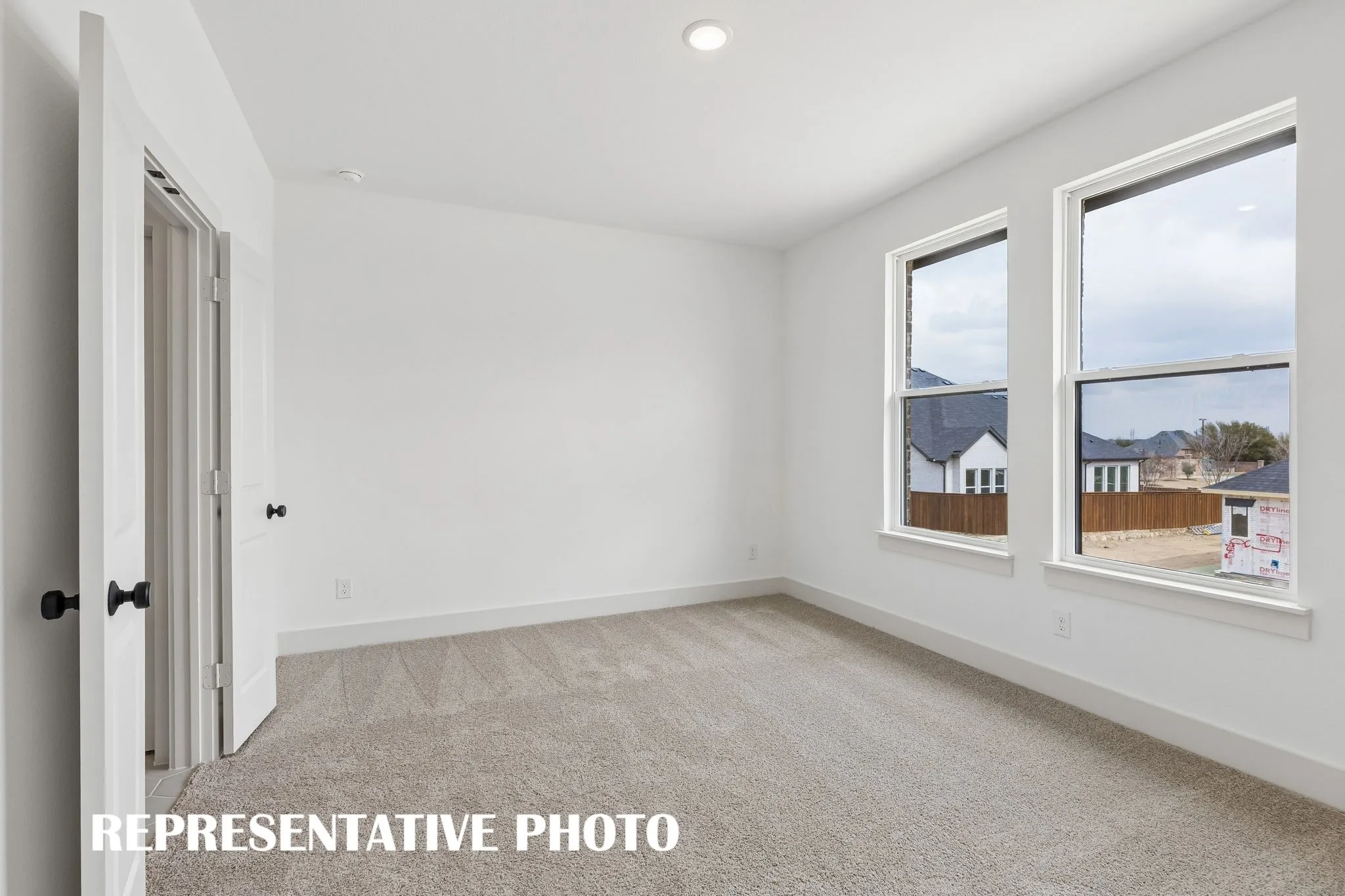 You'll find nicely sized secondary bedrooms in our Colton plan.  REPRESENTATIVE PHOTO