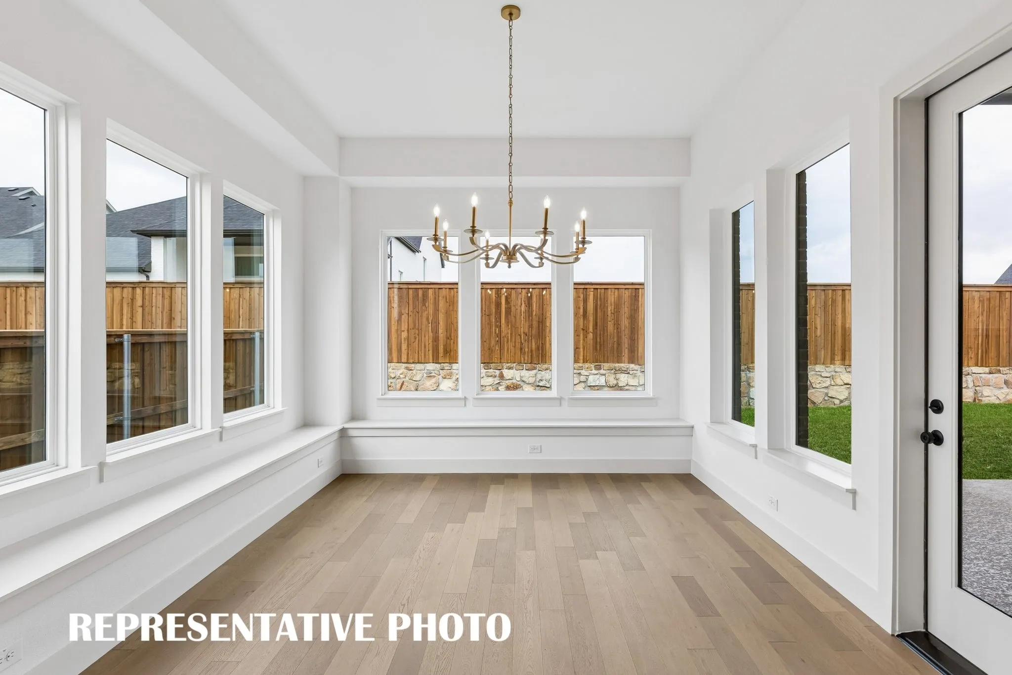 Whether it's lively dinner parties or cozy family get togethers, this dining room fits all occasions!  REPRESENTATIVE PHOTO
