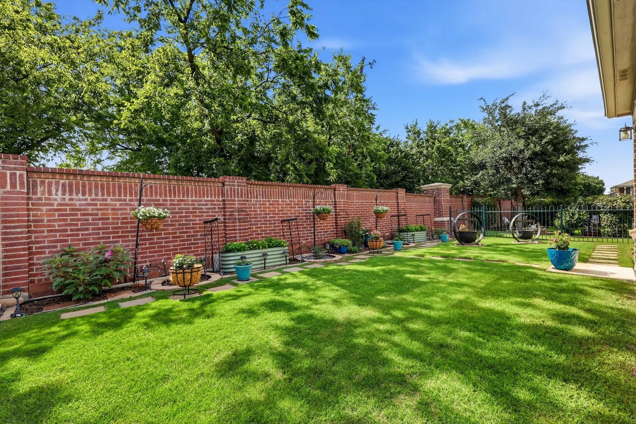 Spacious Backyard with Garden Areas