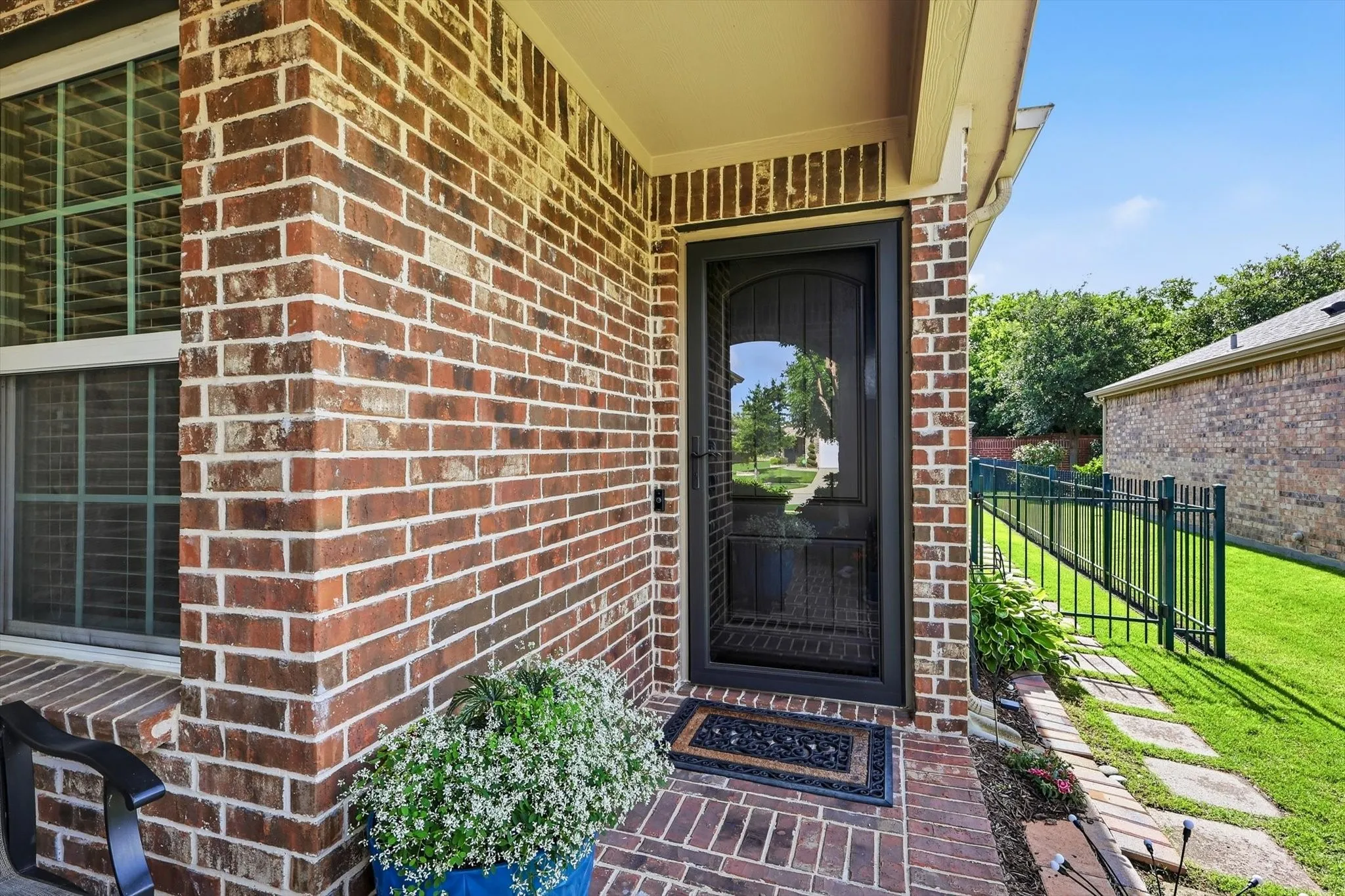 Storm door if perfect to allow front door to be open and let the natural light in