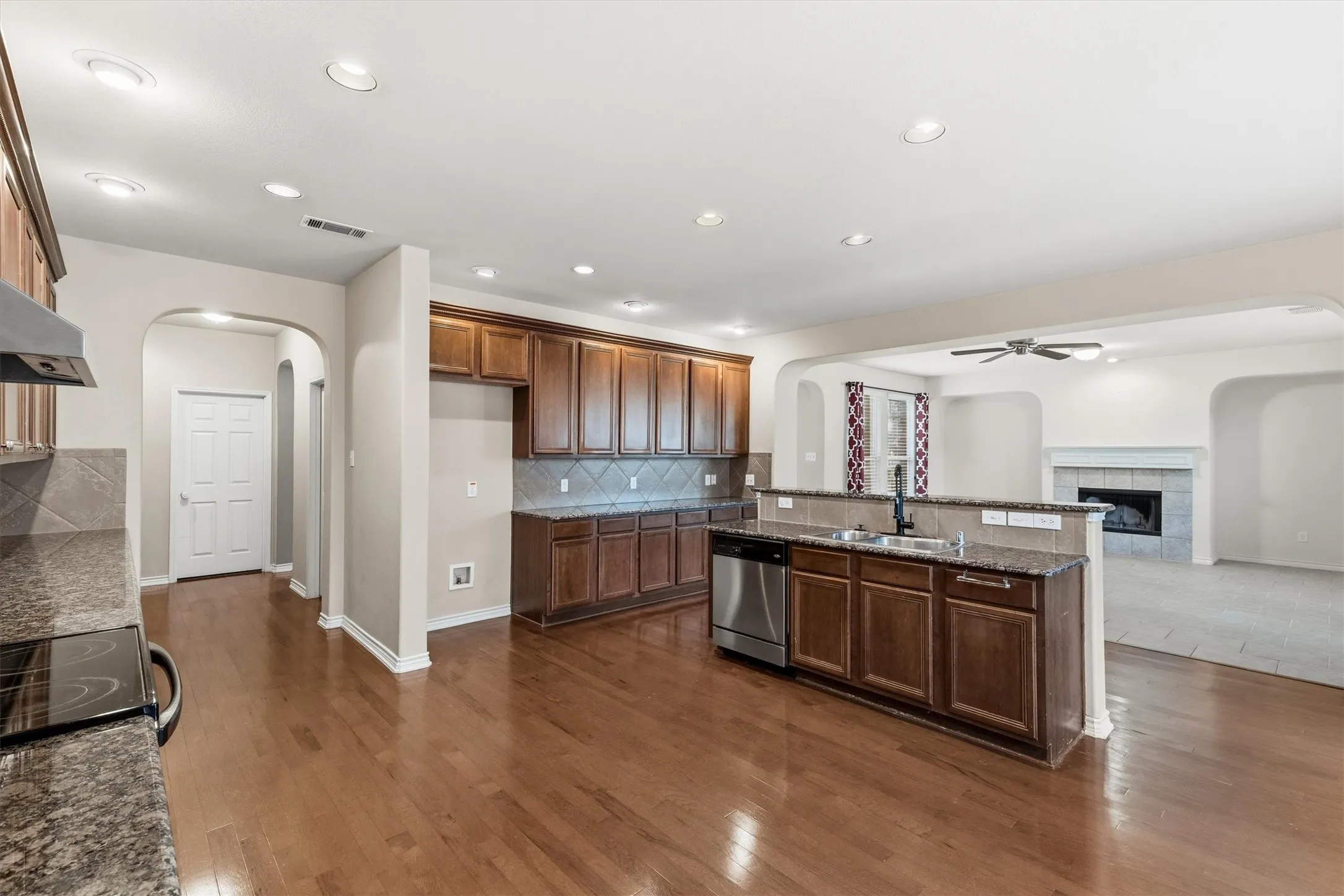 Open kitchen with space for breakfast table. Plenty of counter space as well as cabinets. Walk-in Pantry.