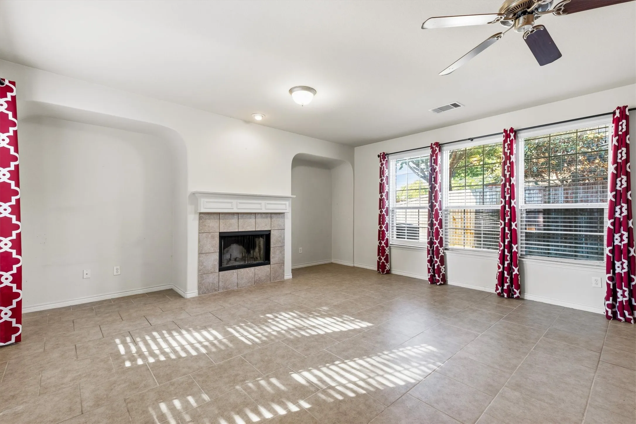 Cozy but spacious living room with great natural lighting. Original living room photo without Virtual staging.