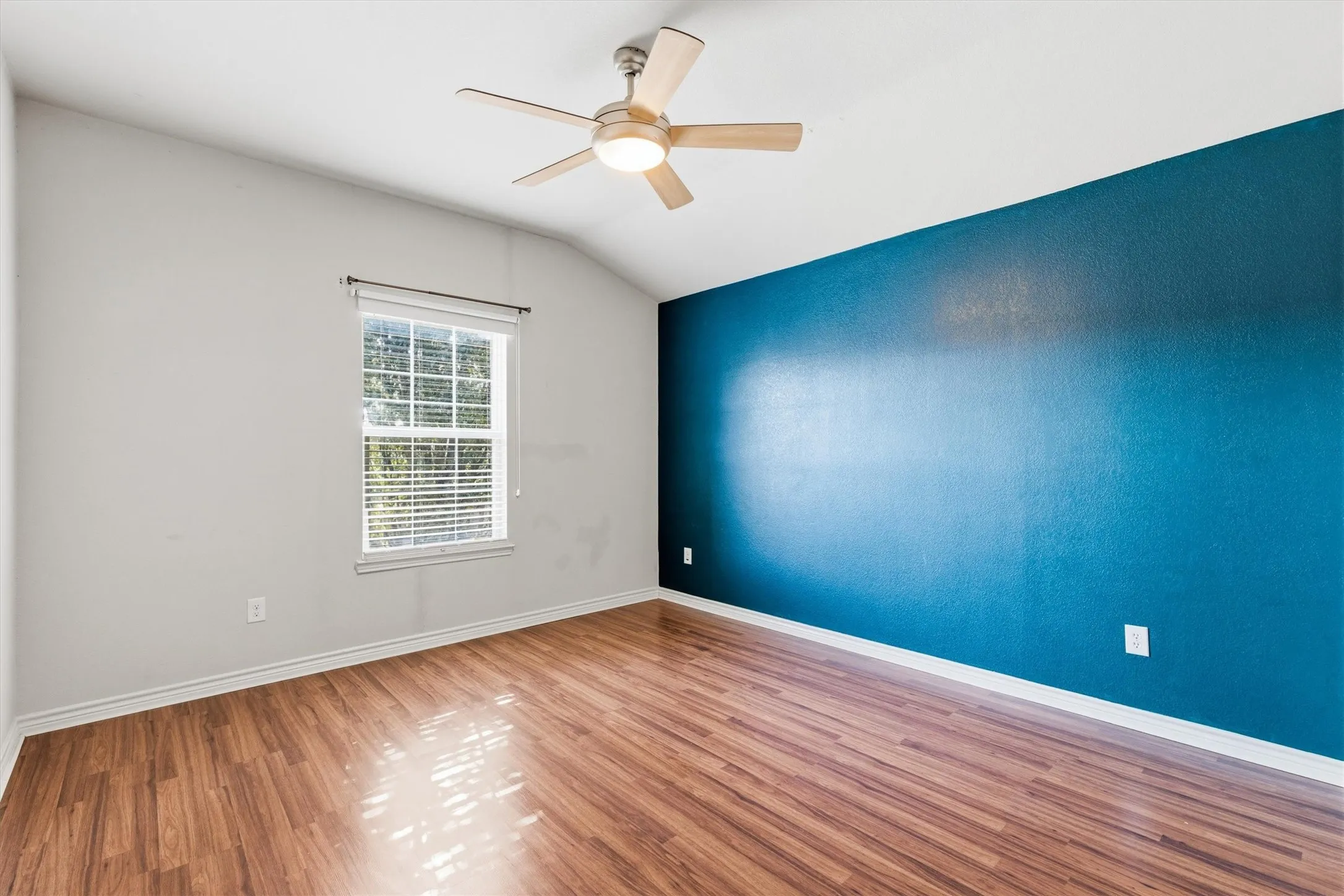 Second floor with a window and closet.