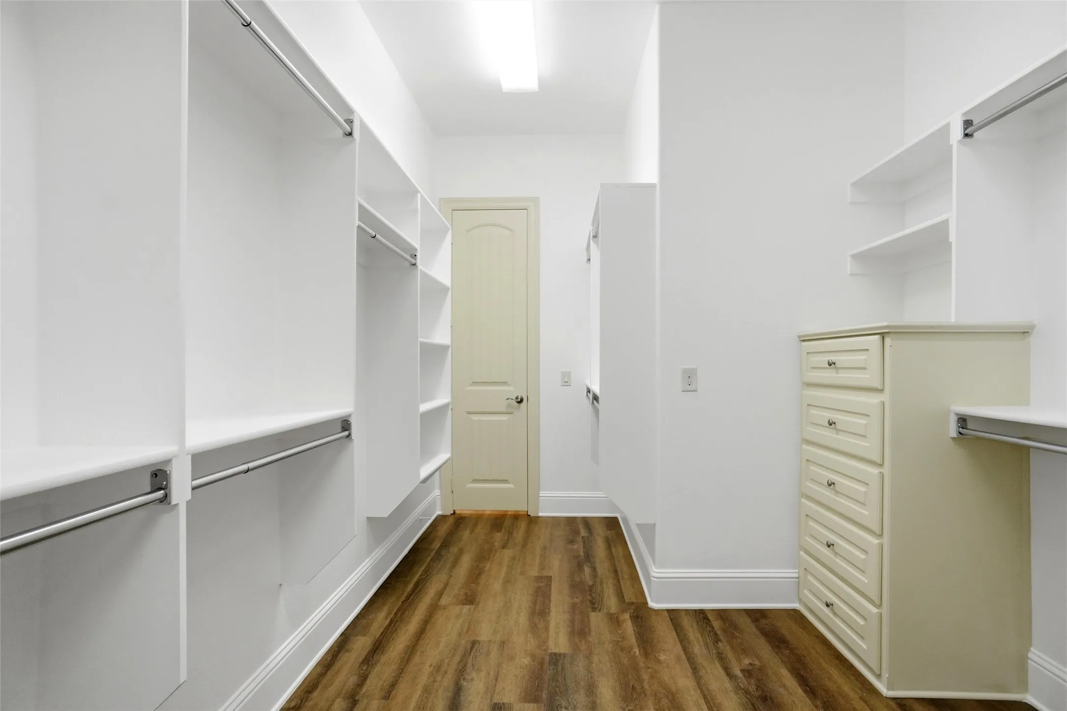 Primary Closet Opens to the Laundry