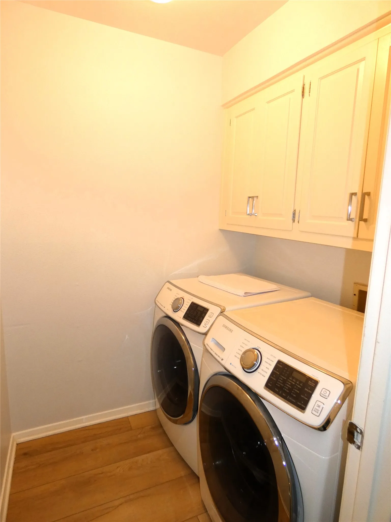 Laundry room with front load washer and dryer.