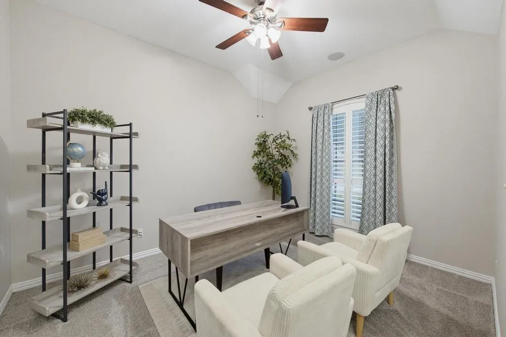 Vaulted ceiling with ceiling fan, recessed lighting, and a window with plantation shutters