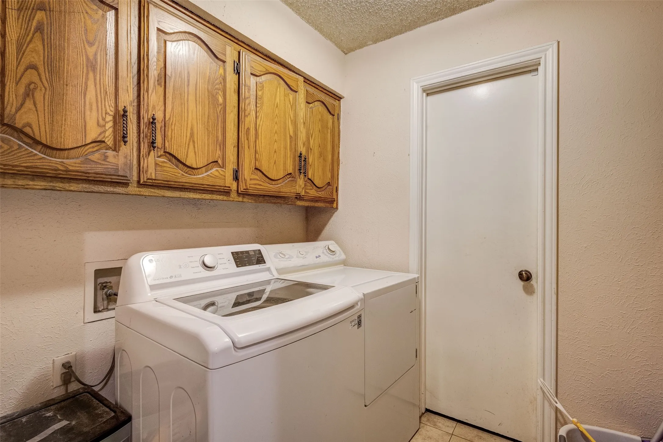 Wood cabinetry with decorative carved details