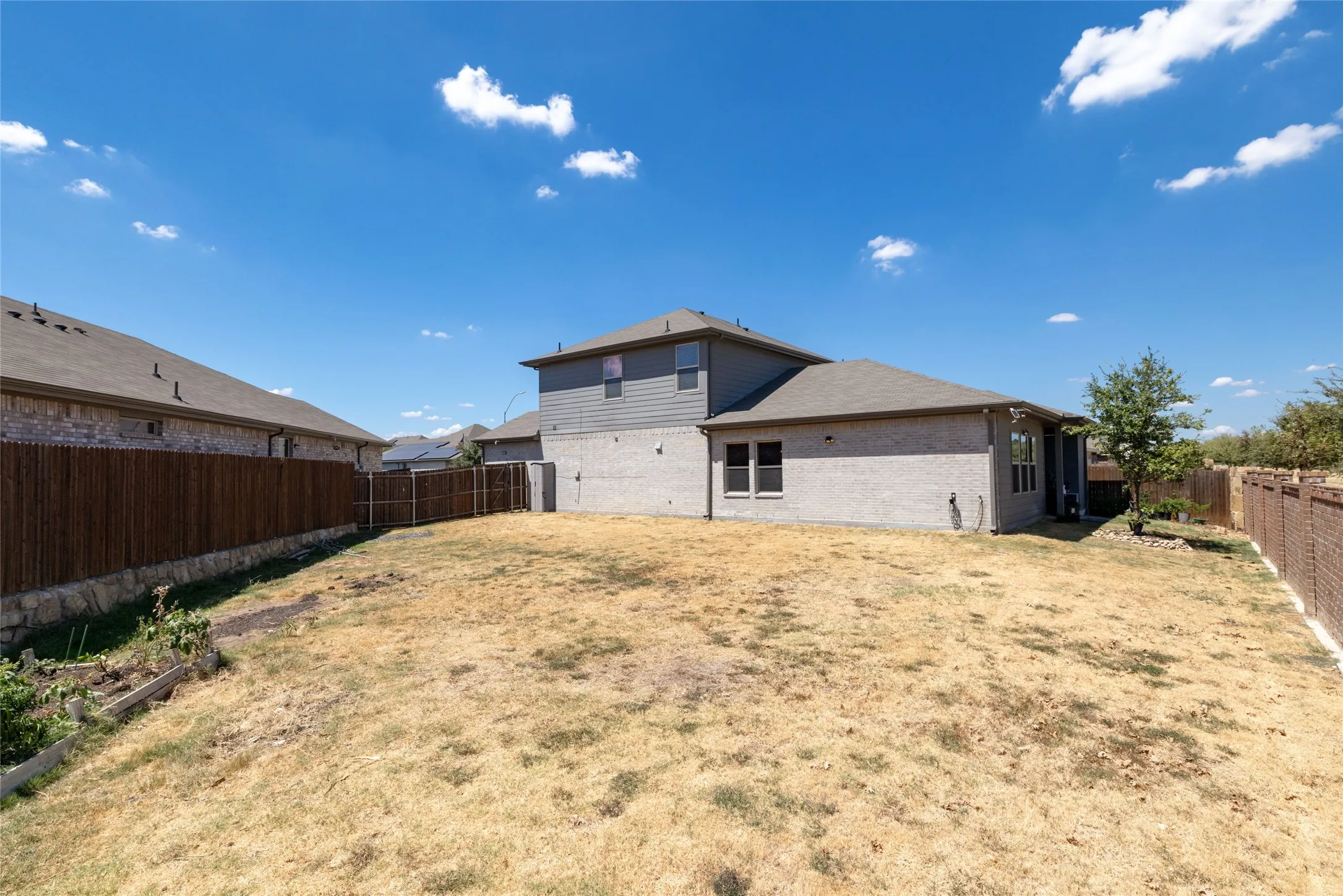 Huge corner backyard with room for activities!