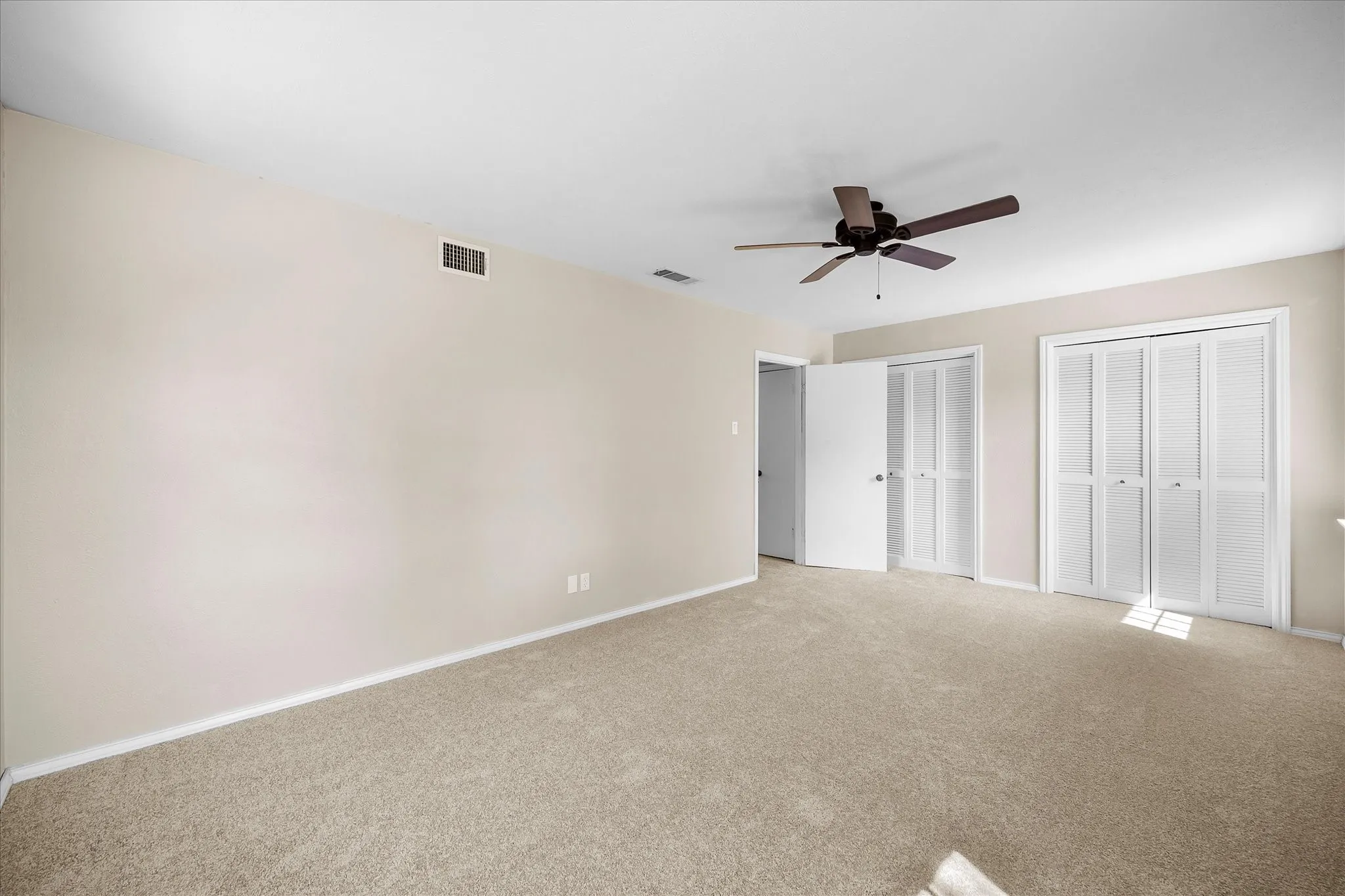 Master bedroom includes separate closets