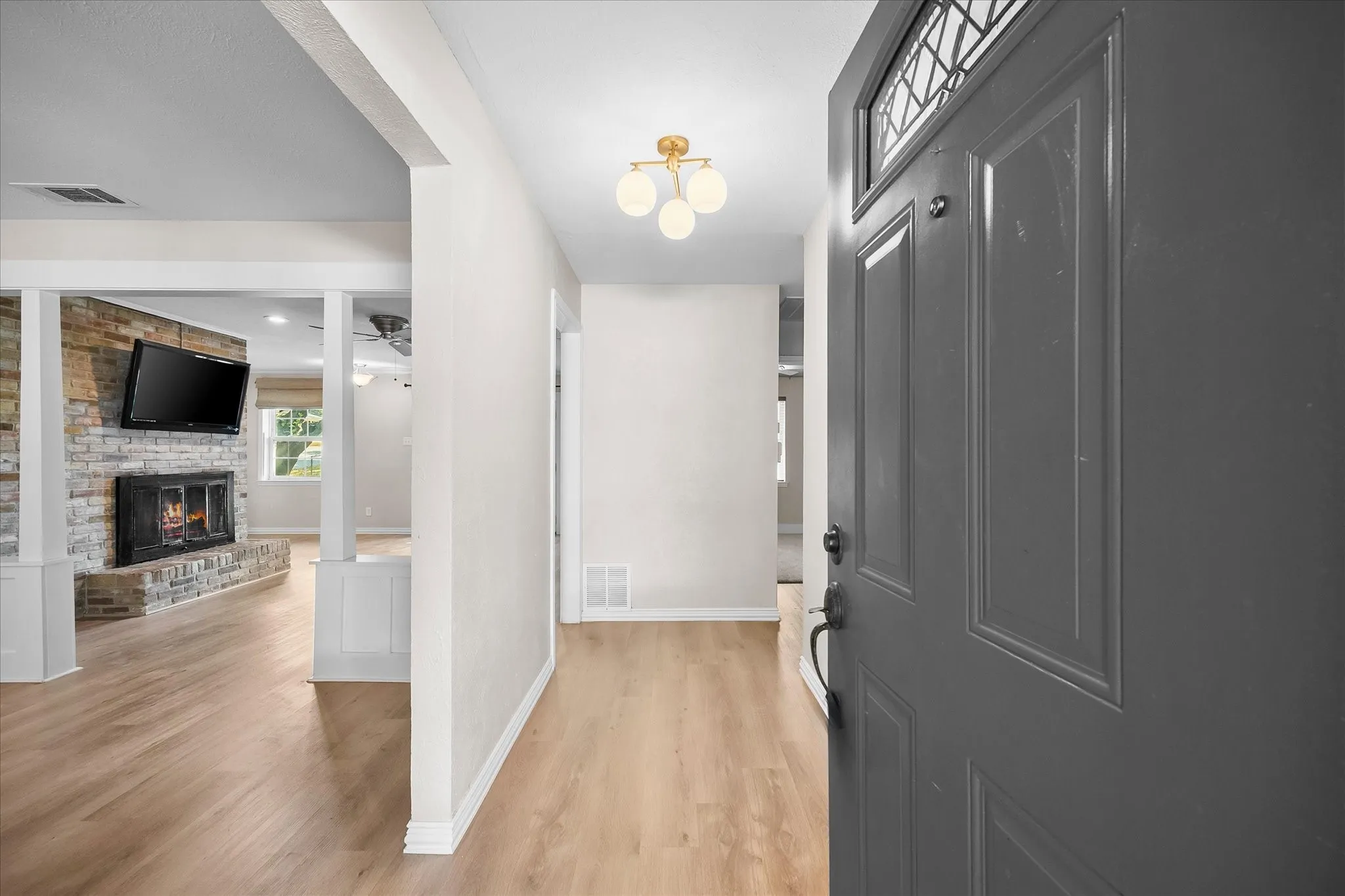 Lovely entry overlooks dining and living areas