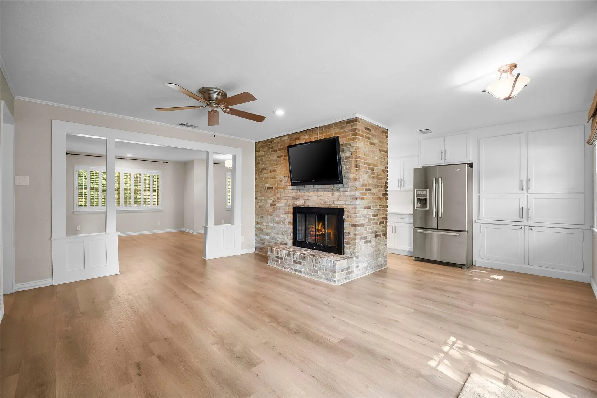 Kitchen opens onto breakfast and family rooms