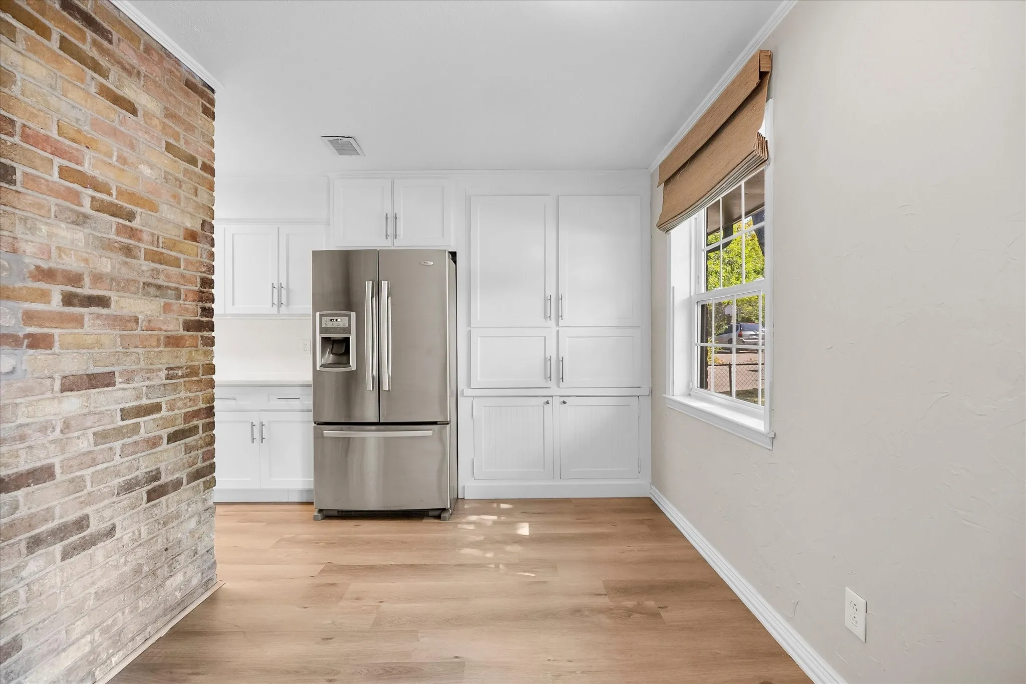 Breakfast area opens onto kitchen