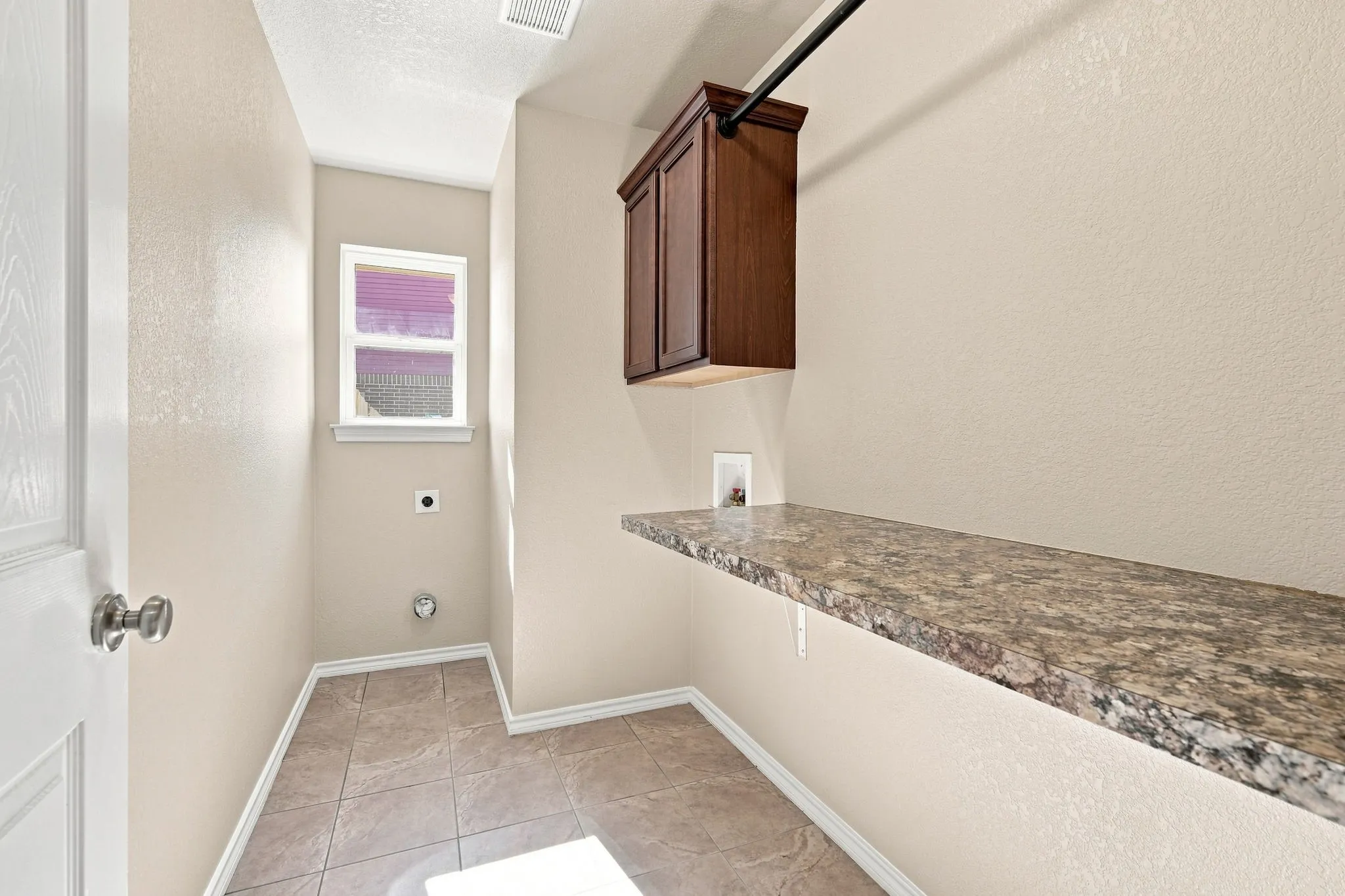 Laundry Room with Folding Shelf