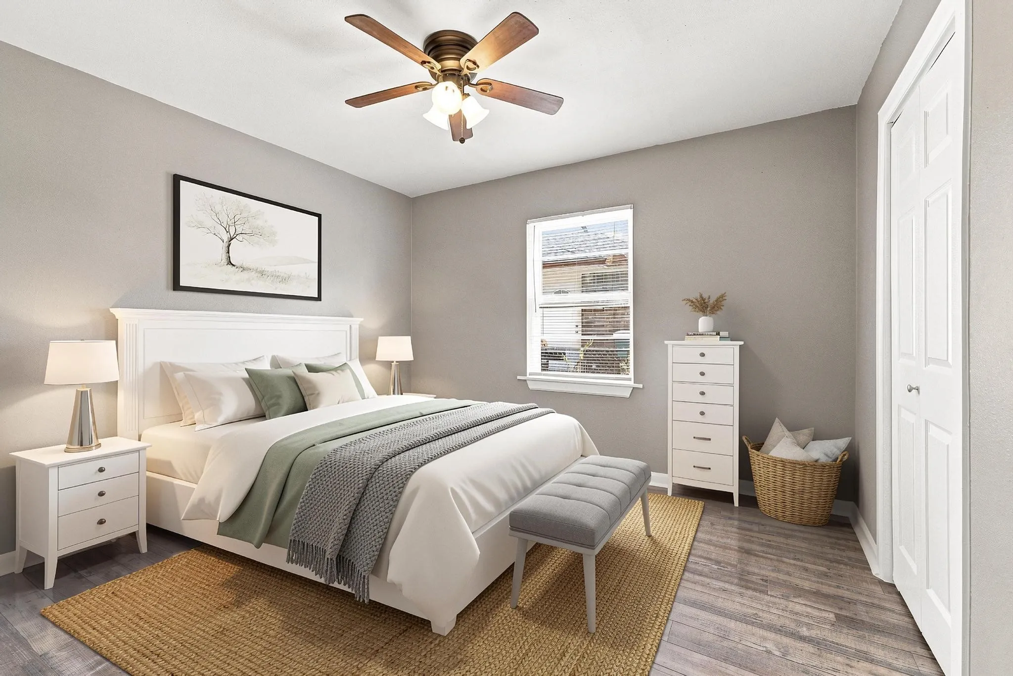 Wood-finish flooring, ceiling fan with integrated lighting, window with white trim, and a white paneled door