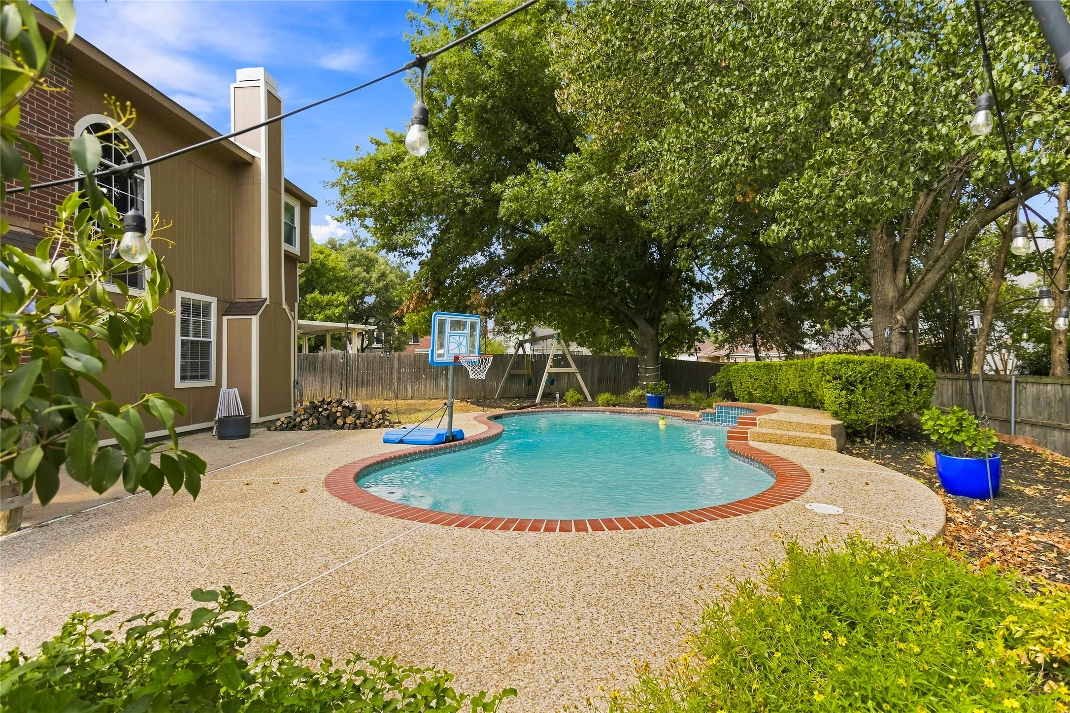 Backyard and pool from West fence line