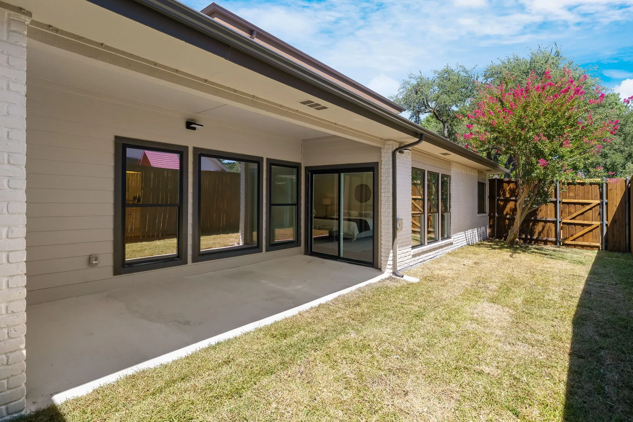 4402 Briargrove-Private covered patio just off the primary suite, creating a seamless indoor-outdoor retreat.
