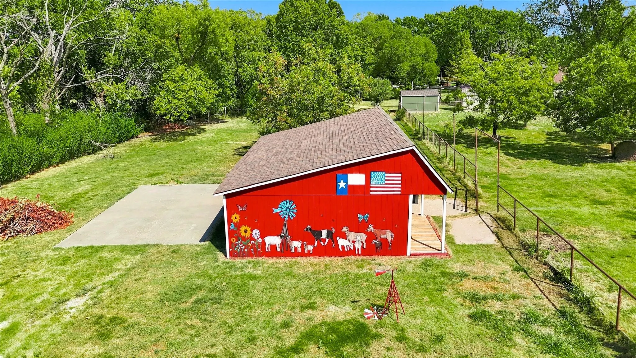 Water and electric. Rolling garage doors and 220V electric.  Back pad for boat or RV parking.  Could make into a mother in law, apartment perhaps for income producing if wanted.