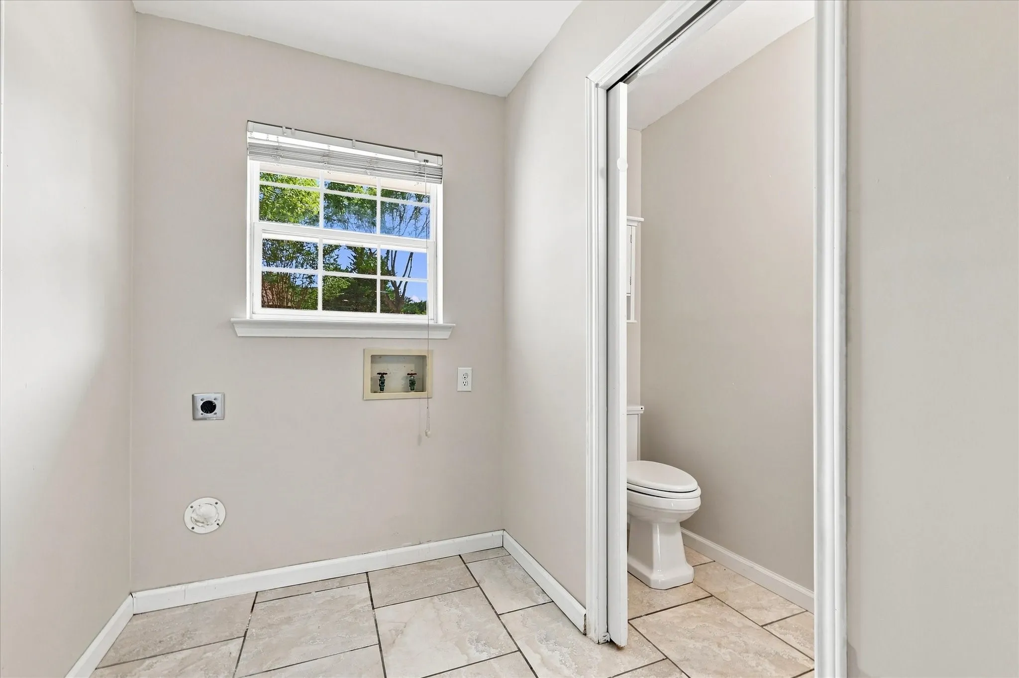 laundry room with half bath