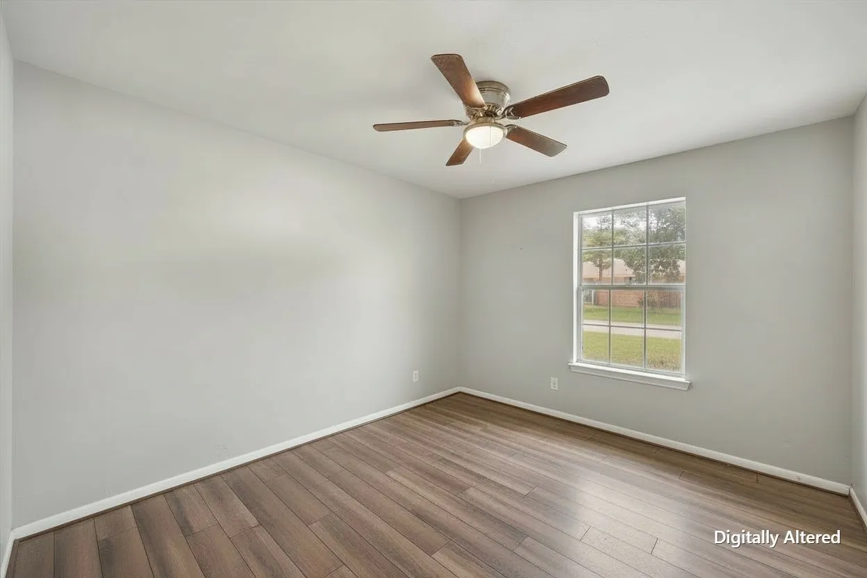Empty bedroom provides a clear view of the flexible floor plan and neutral finishes available to current or future tenants.