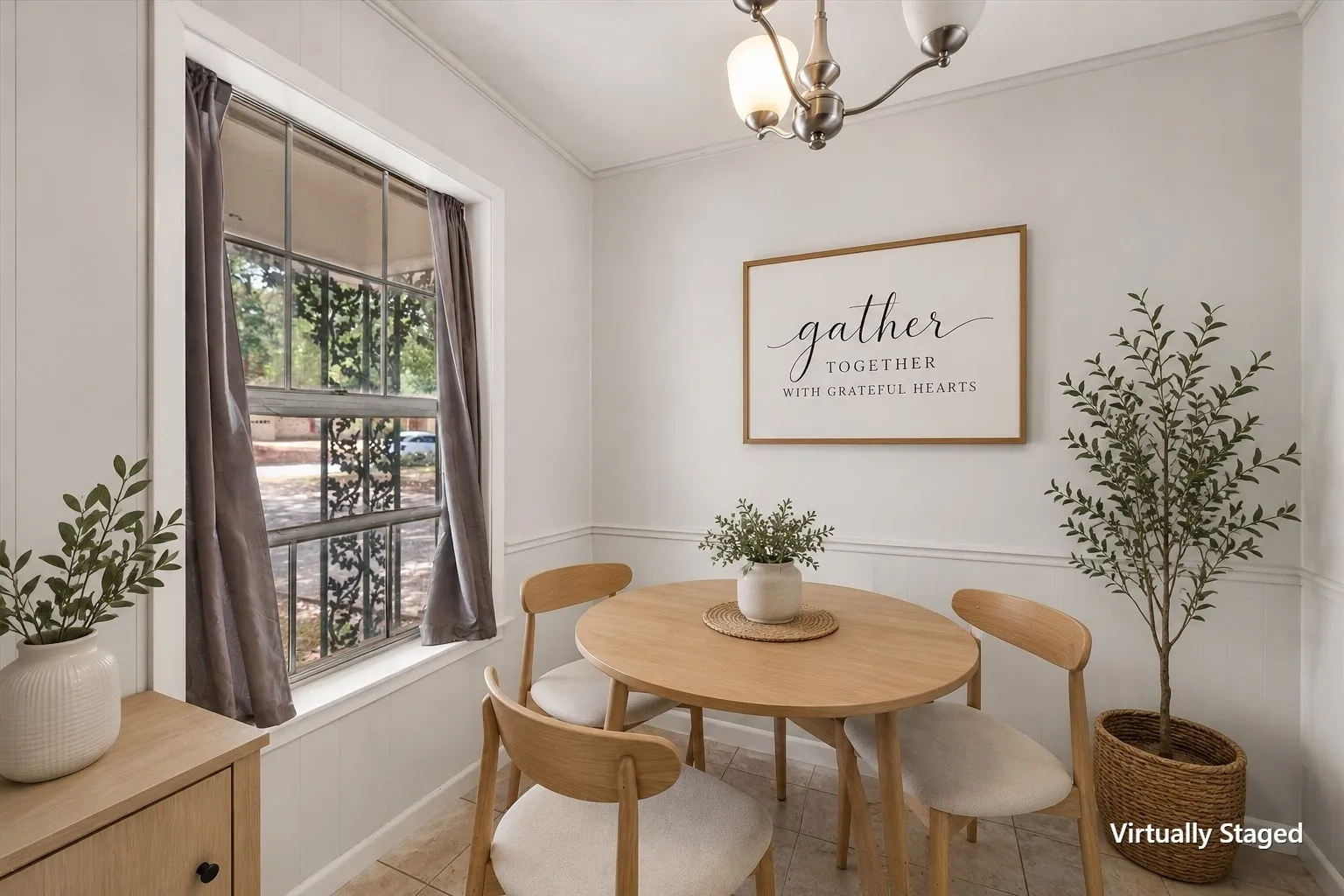 Virtually staged breakfast nook demonstrates how this Corsicana investment property's eat-in kitchen area can accommodate a comfortable dining space.