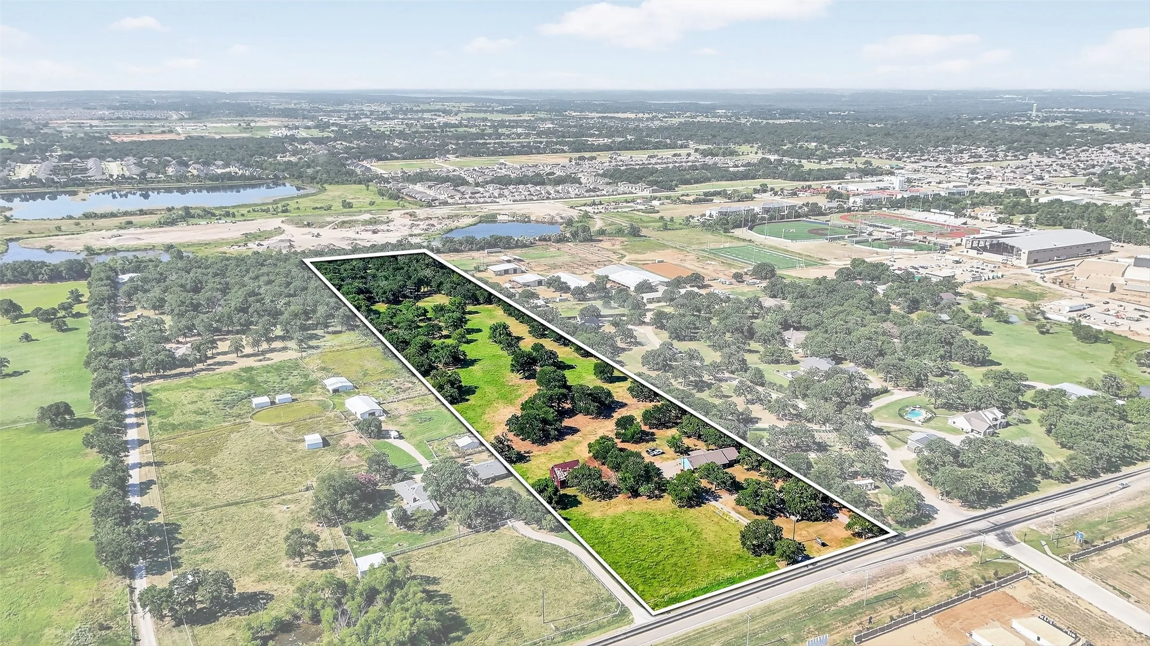 Expansive property lot featuring mature trees and clearings