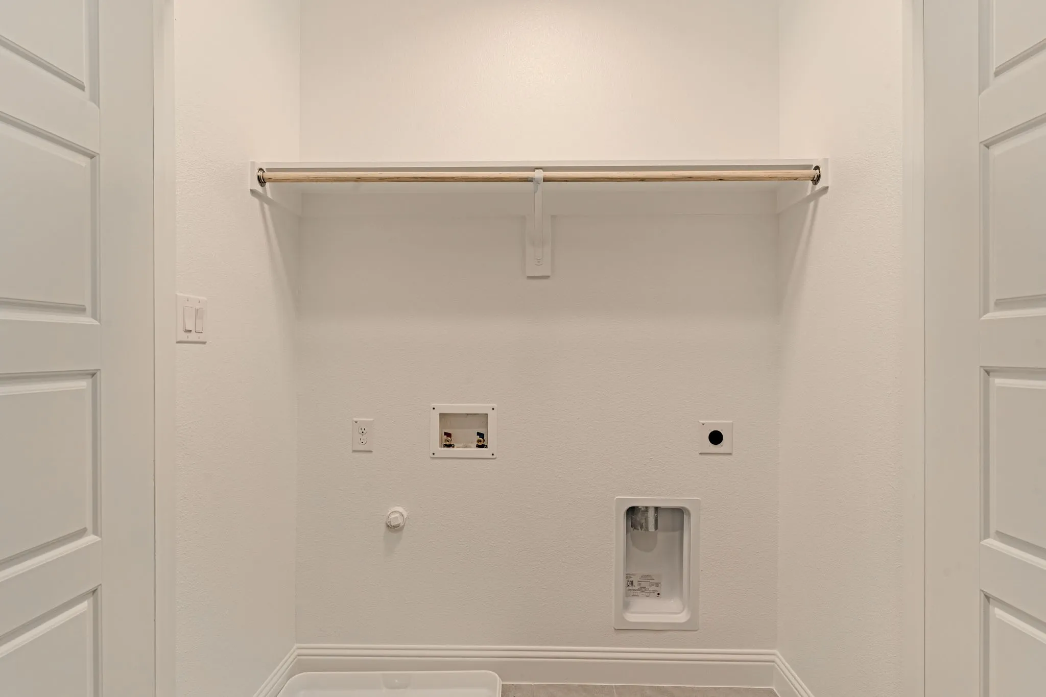 Full size washer dryer area
