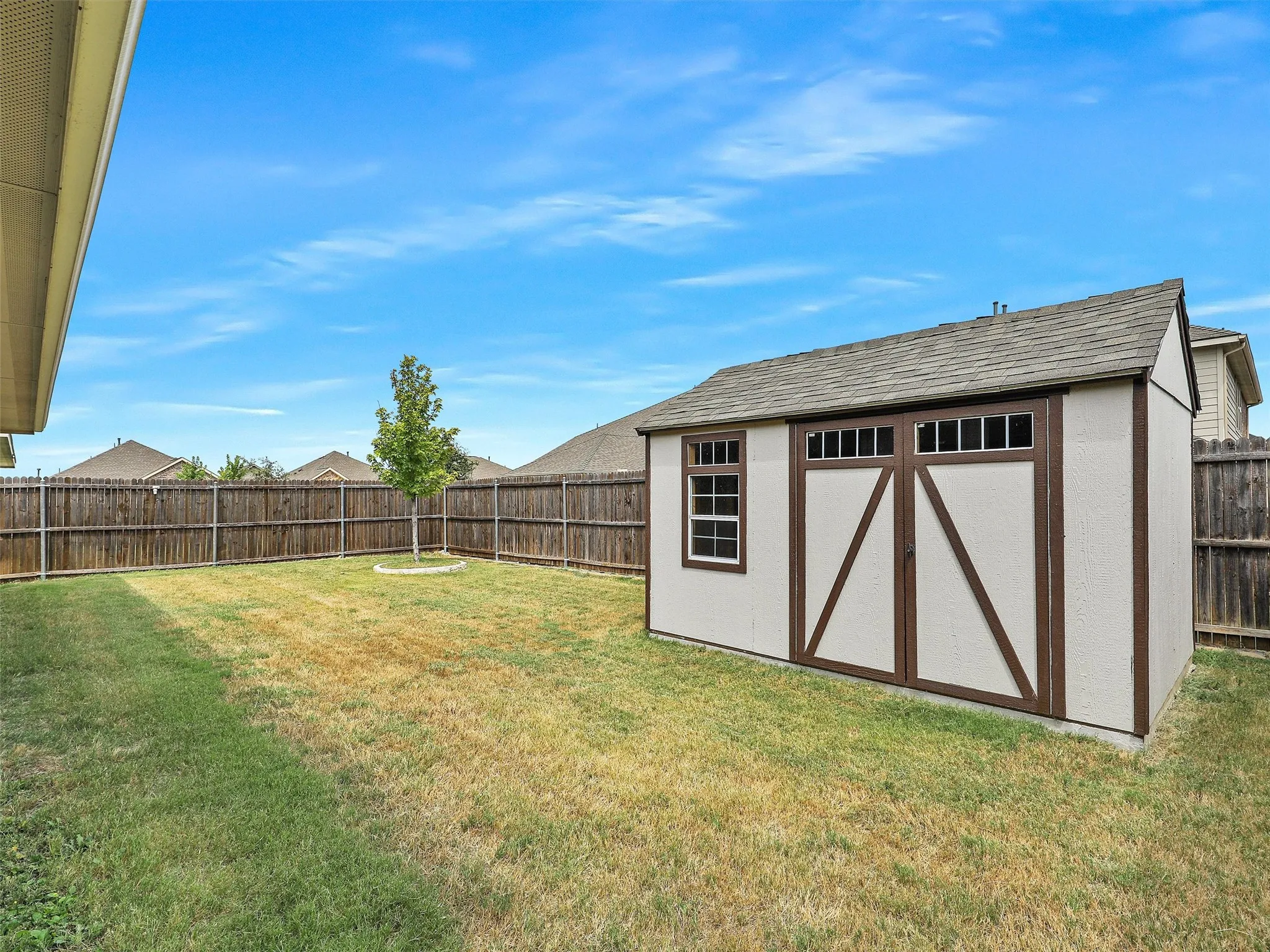 Wood construction shed on concrete slab