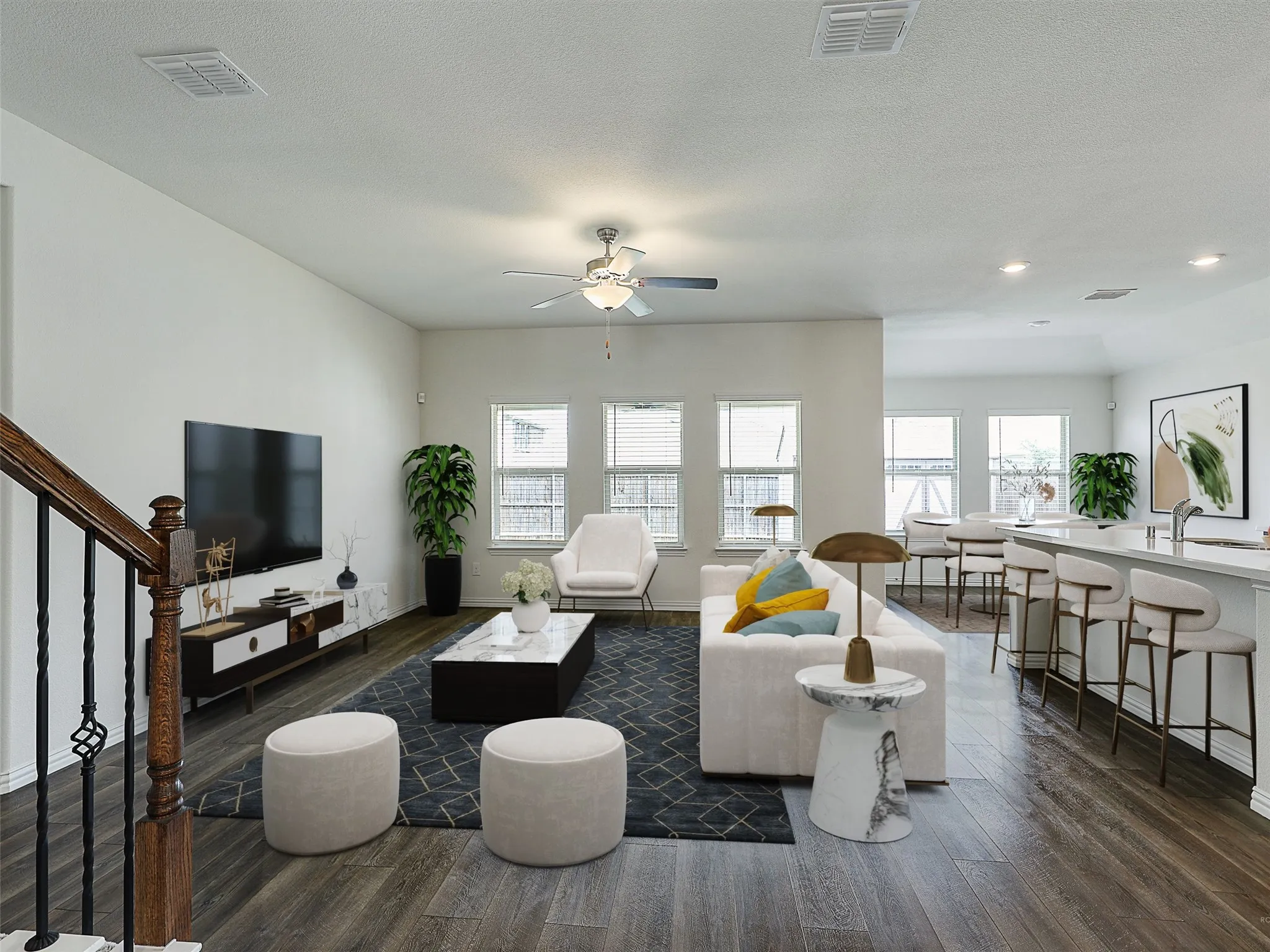 Open-concept living room virtually staged