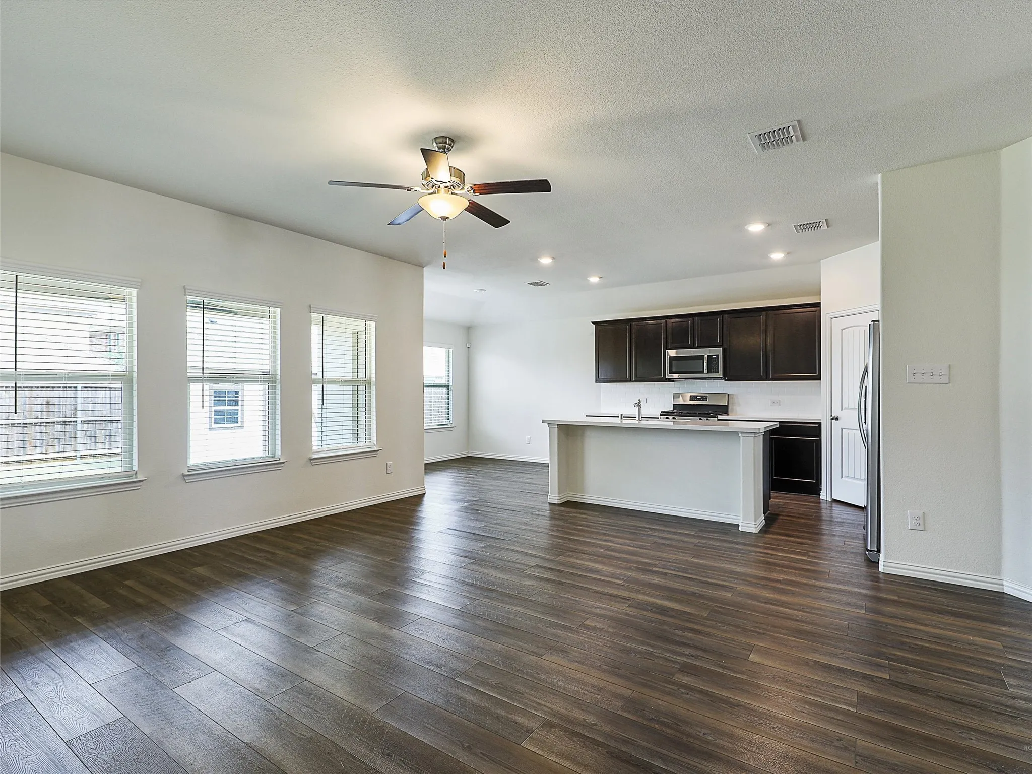 Living room looking toward kitchen