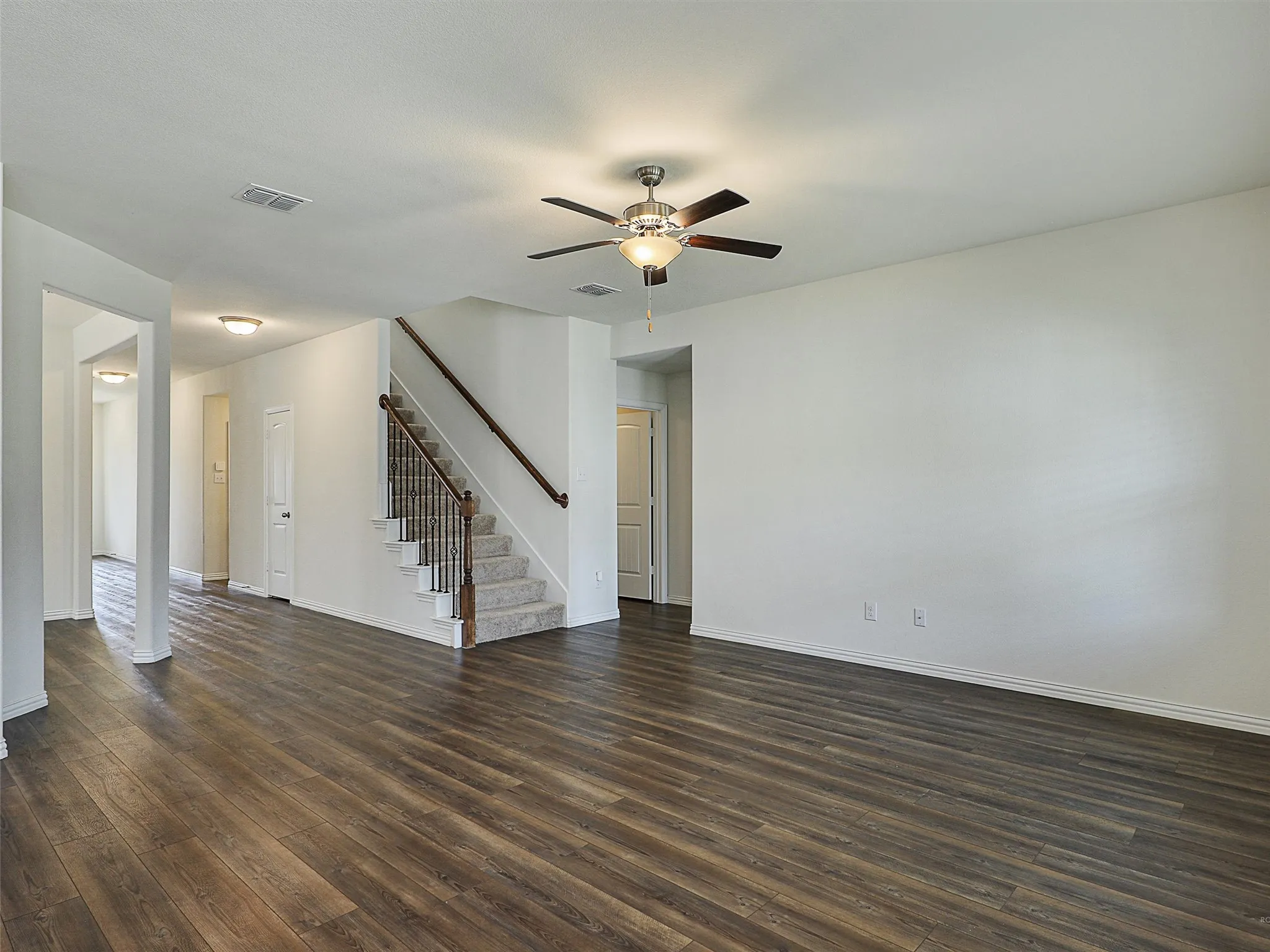 Living room looking towards hall & stairs