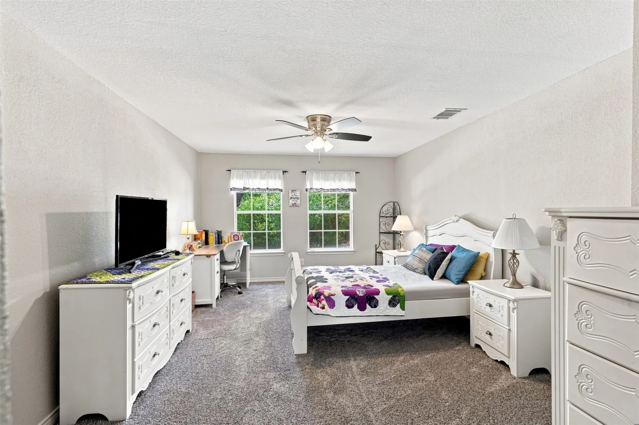 This room is very spacious, it can be a secondary primary bedroom, it has walk in closet, and a full bathroom next to the room