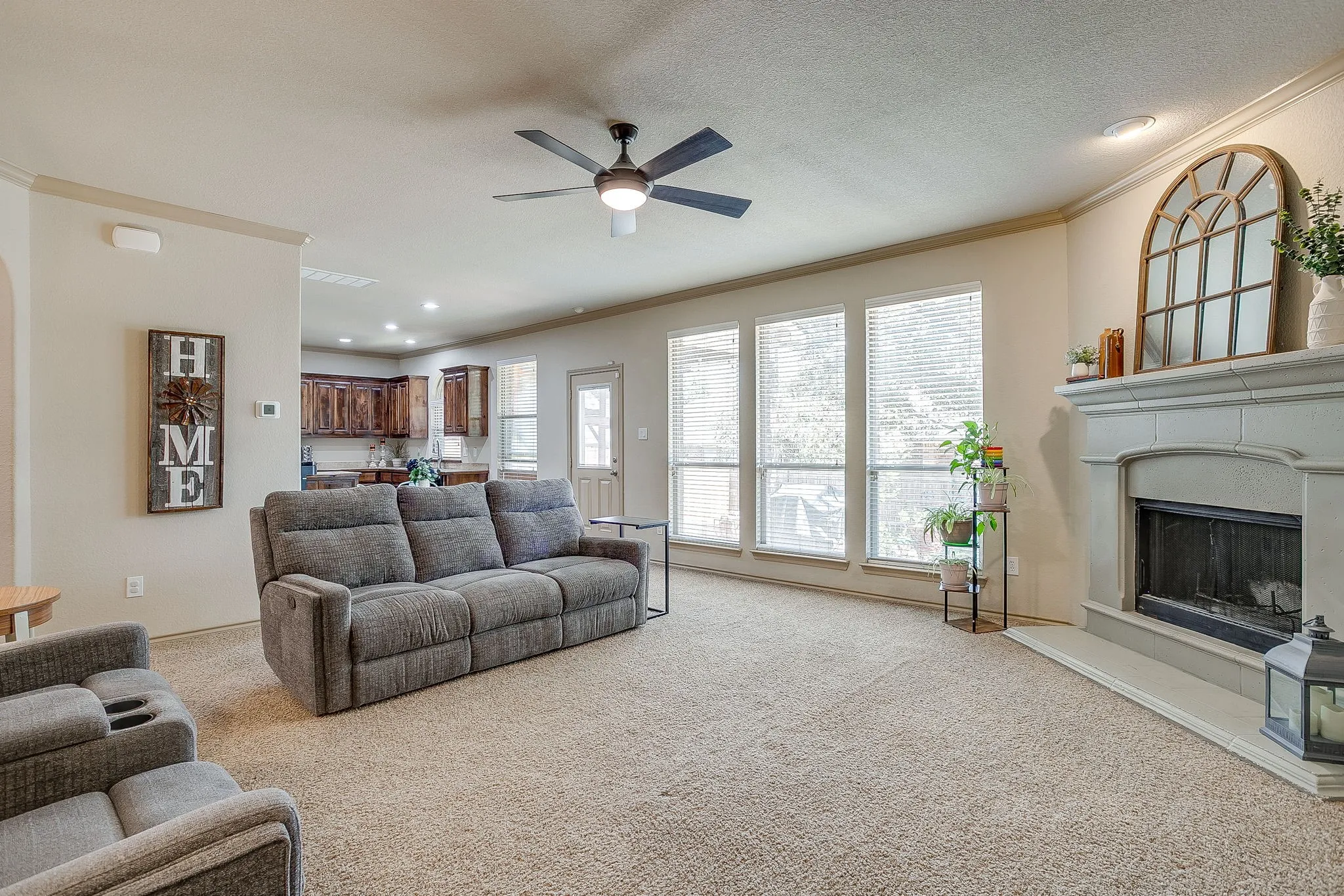 Carpet throughout the living room.