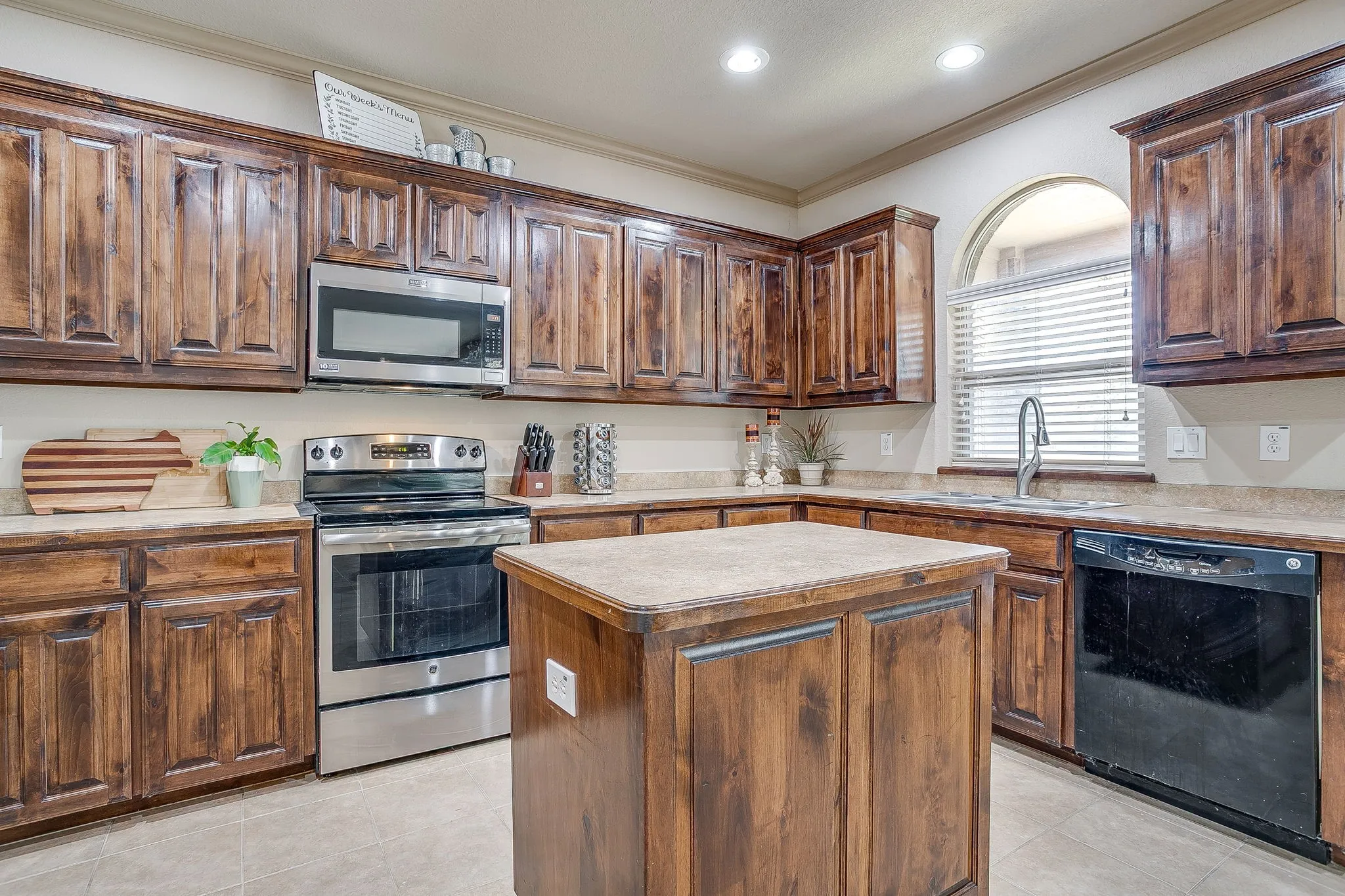 Beautiful wood cabinetry, abundant storage and countersapce.
