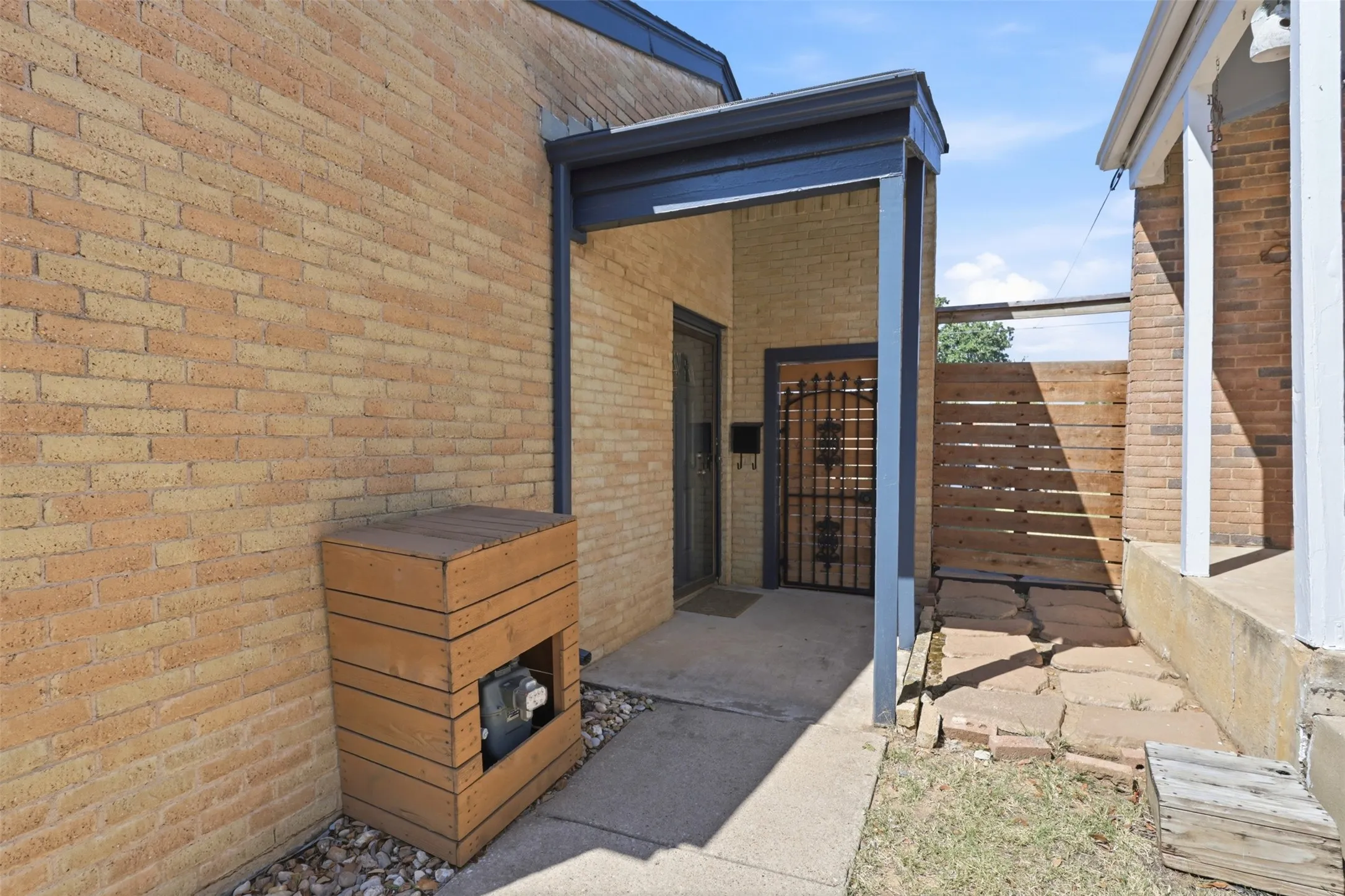 Covered entry offers additional privacy before stepping inside the home.