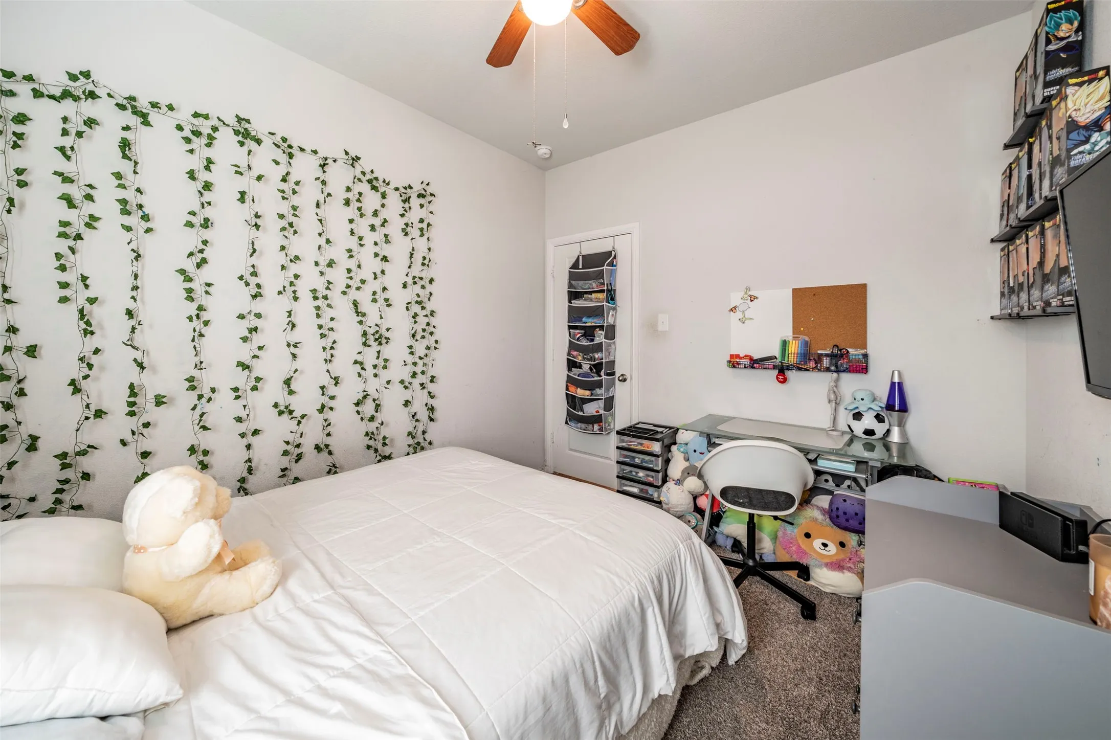 Recessed lighting, ceiling fan, and carpeted flooring