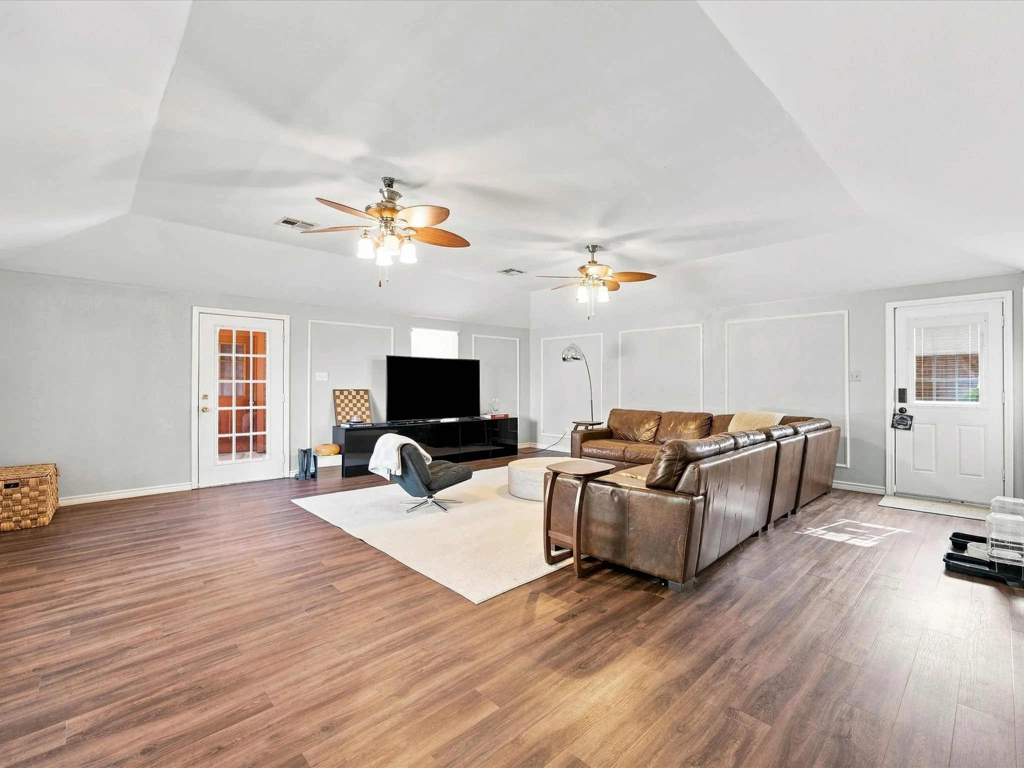 Second living space with door to the breezeway and Guest House