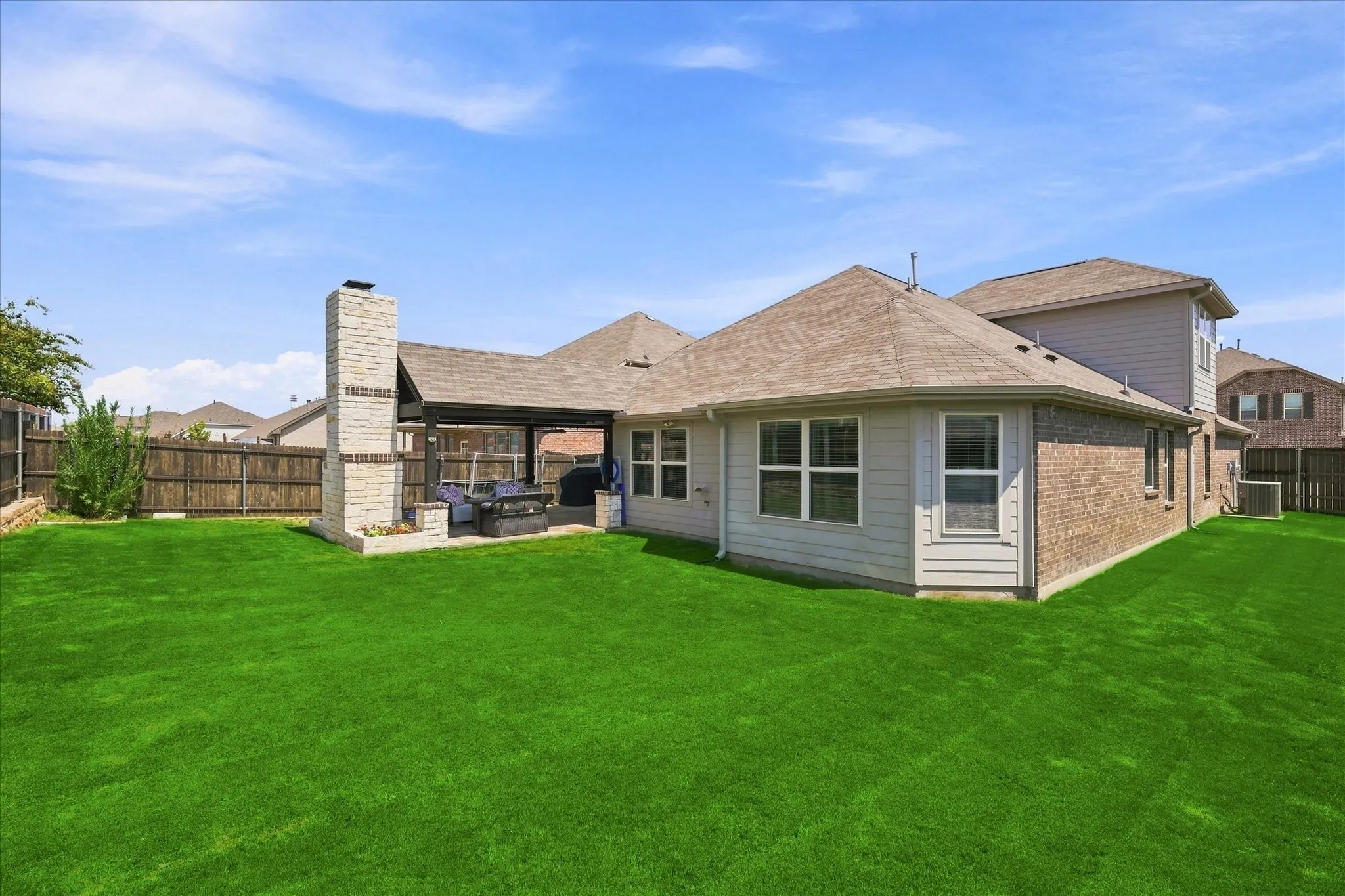 The Extra Large Fenced Back Yard provides Plenty of Space for Outdoor Activities.