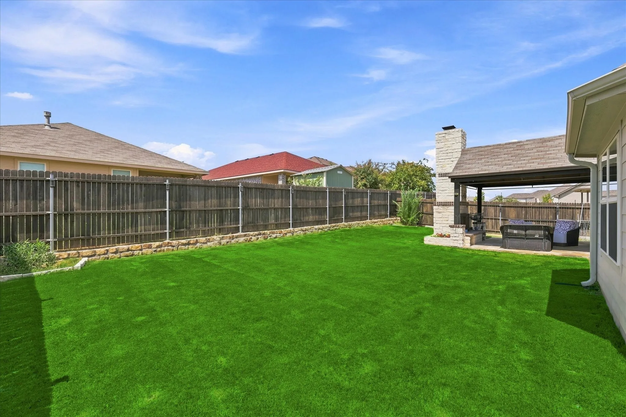 The Extra Large Fenced Back Yard provides Plenty of Space for Outdoor Activities.