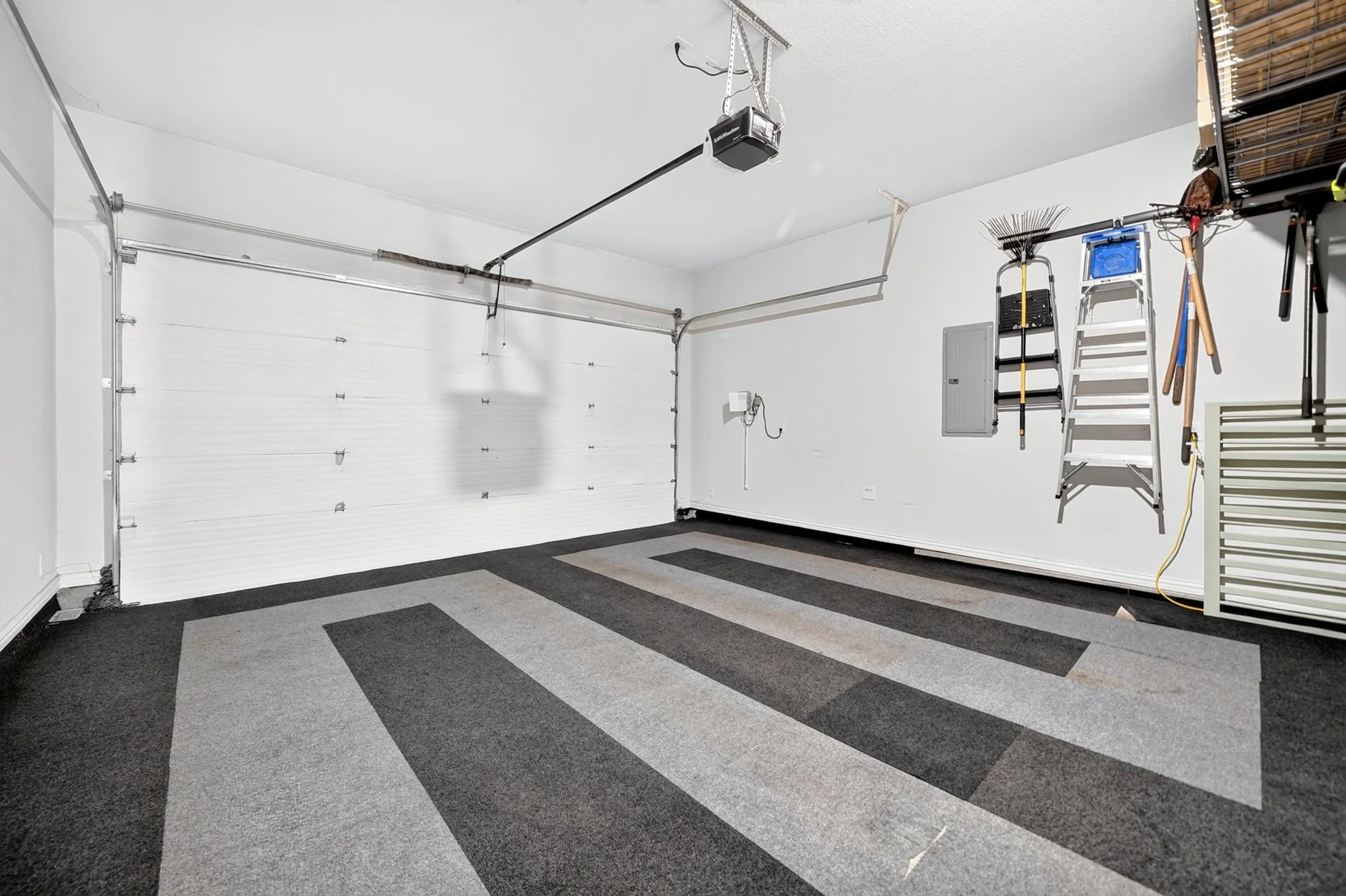 Carpeted and taller than the average garage
