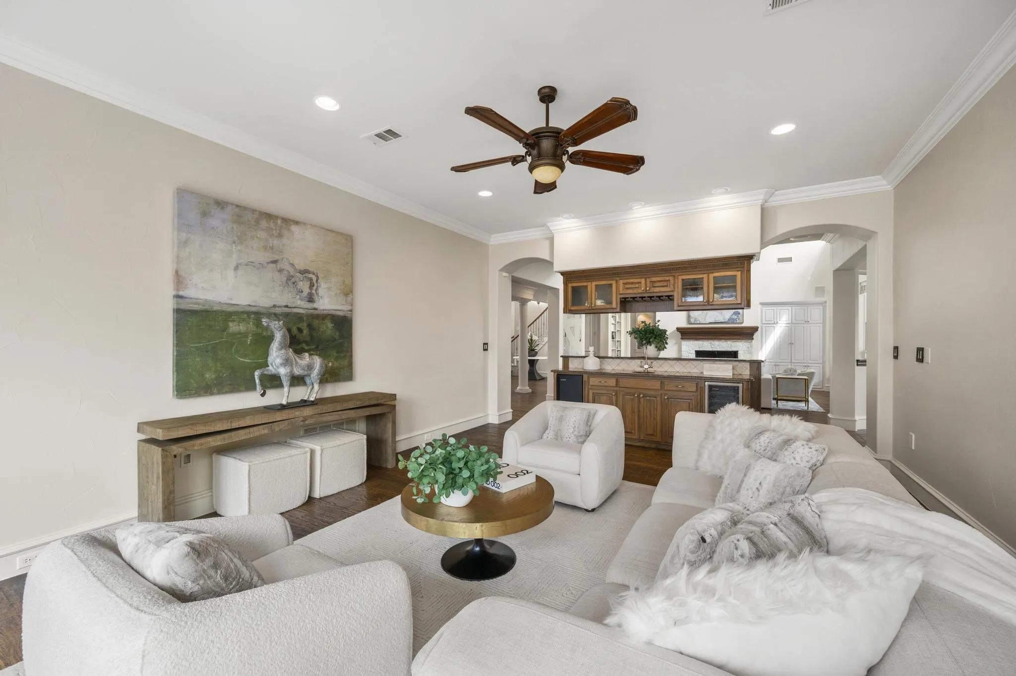 Downstairs den or game room that connects to kitchen.