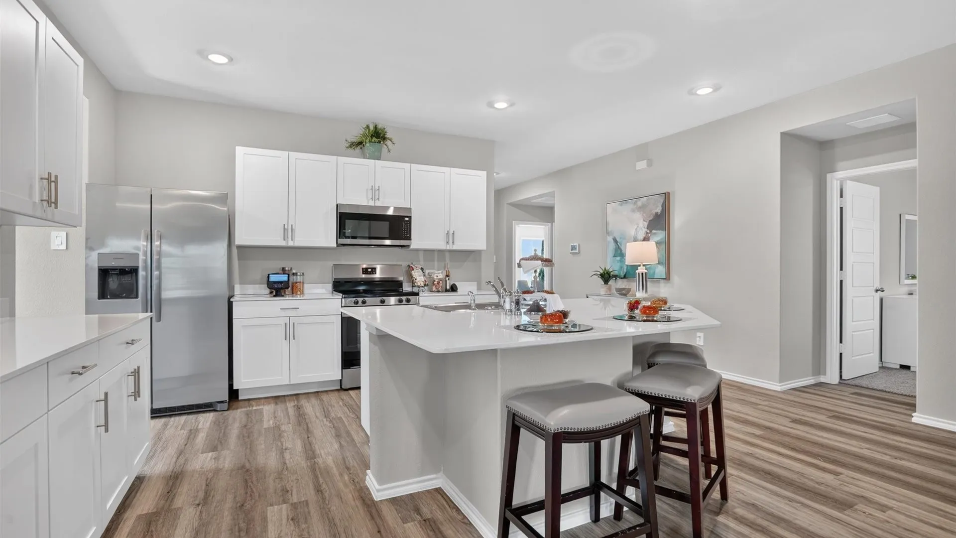 Kitchen-  All Home and community information, including pricing, included features, terms, availability and amenities, are subject to change at any time without notice or obligation. All Drawings, pictures, photographs, video, square footages, floor plans, elevations, features, colors and sizes are approximate for illustration purposes only and will vary from the homes as built.