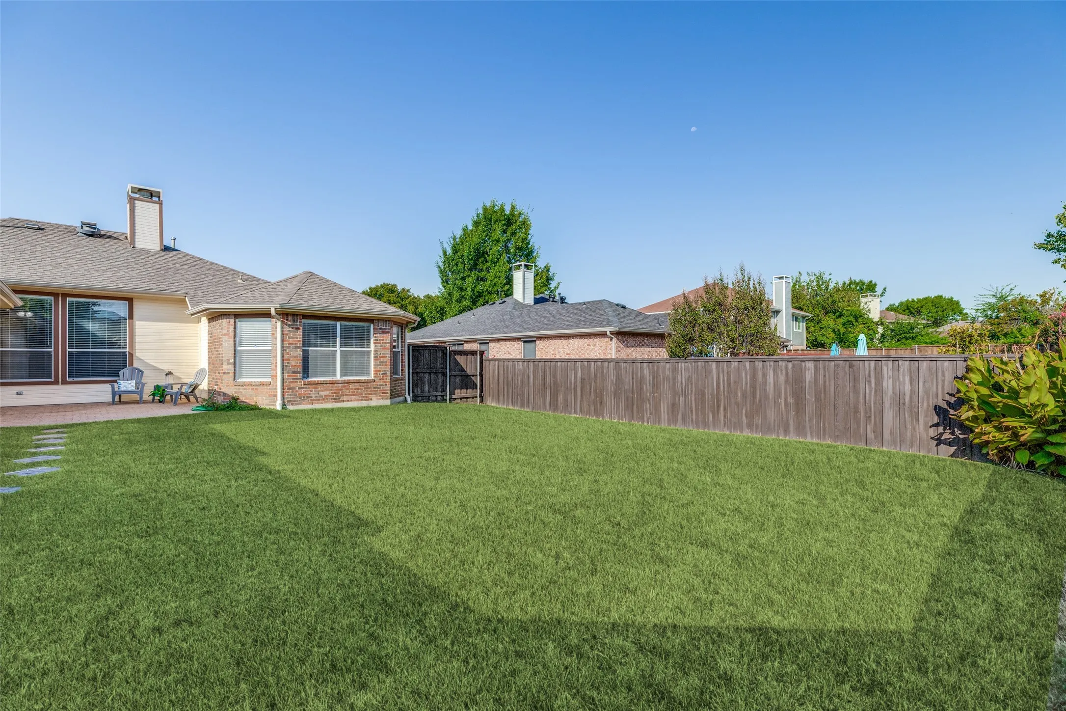 well cared for big yard with updated Board on Board cedar fence