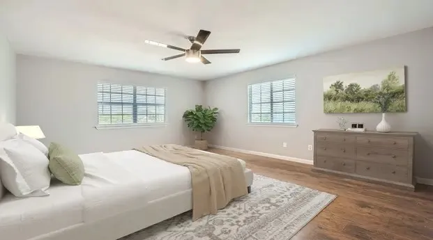Recessed lighting, wood-finish flooring, two windows with blinds, and a ceiling fan with integrated lighting