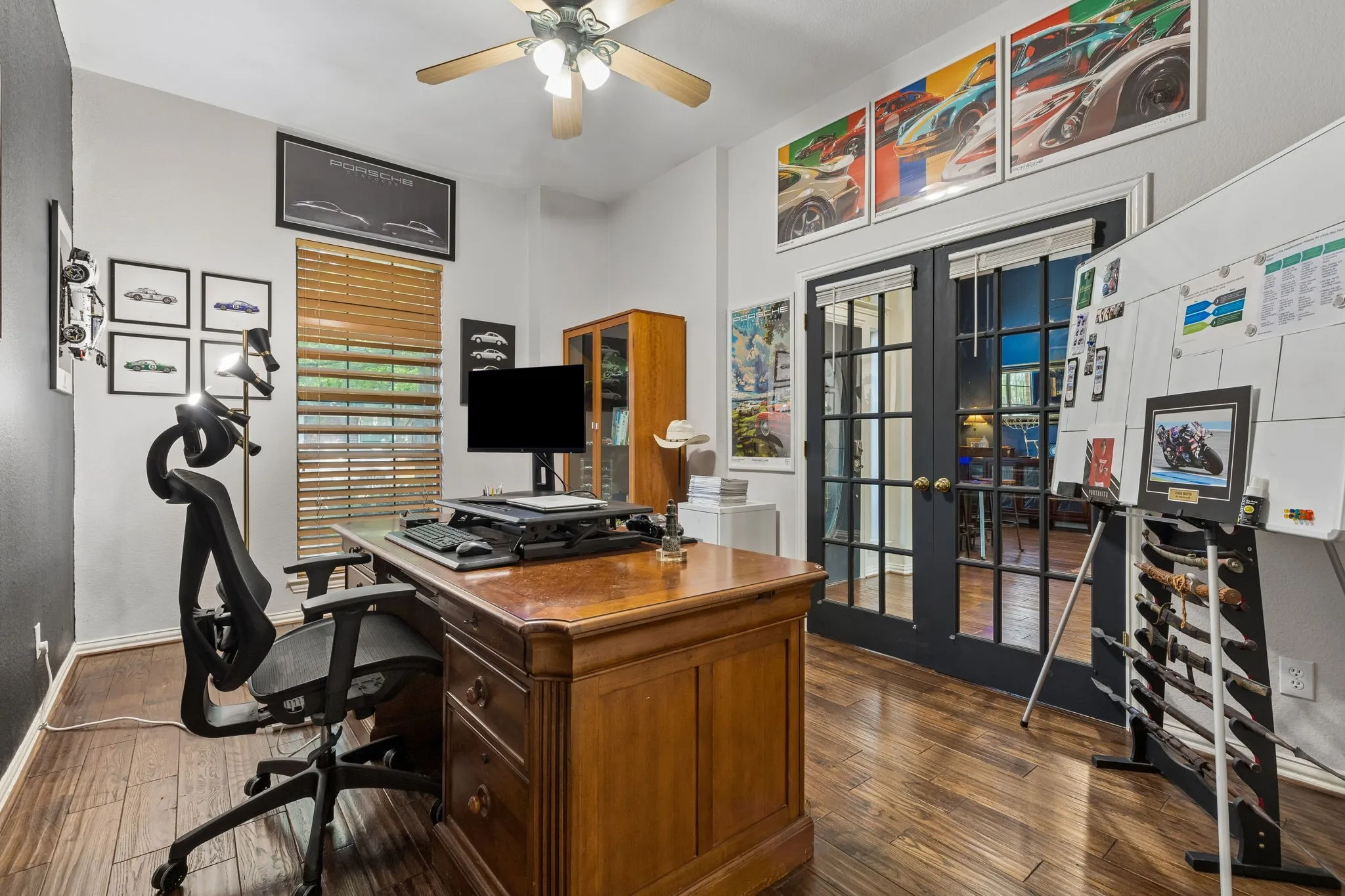 Office with closet and double doors.