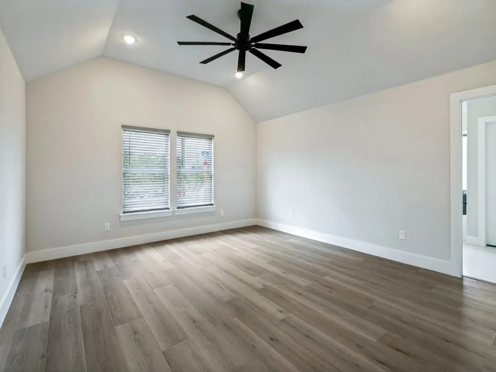 Primary Bedroom with hard surface flooring