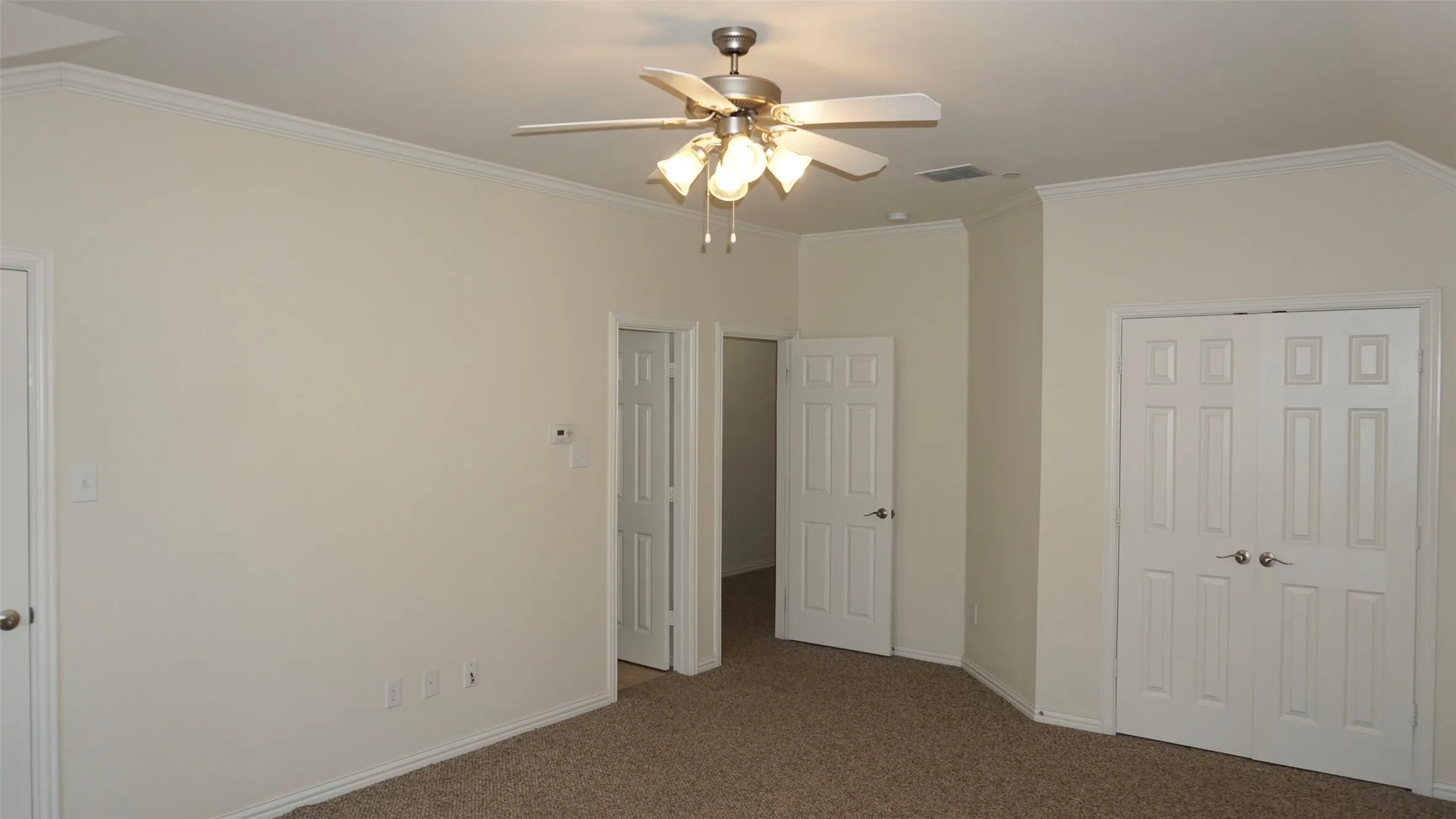 Large Primary Bedroom With Two Closets
