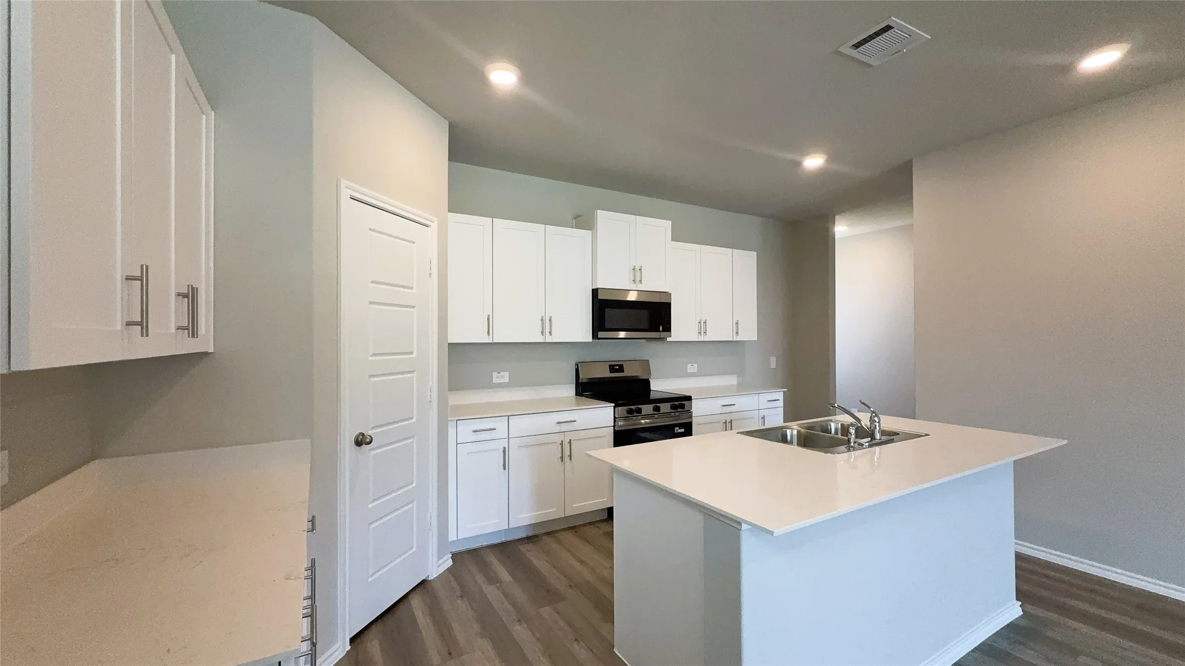 Kitchen - All Home and community information, including pricing, included features, terms, availability and amenities, are subject to change at any time without notice or obligation. All Drawings, pictures, photographs, video, square footages, floor plans, elevations, features, colors and sizes are approximate for illustration purposes only and will vary from the homes as built.
