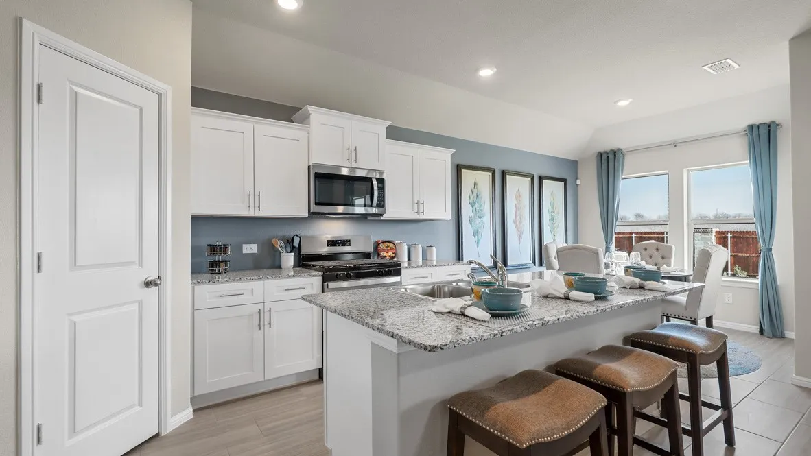 Kitchen - All Home and community information, including pricing, included features, terms, availability and amenities, are subject to change at any time without notice or obligation. All Drawings, pictures, photographs, video, square footages, floor plans, elevations, features, colors and sizes are approximate for illustration purposes only and will vary from the homes as built.
